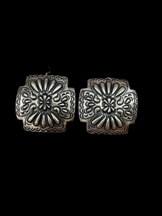 Stamped Concho Earrings by L. Tahe, Navajo