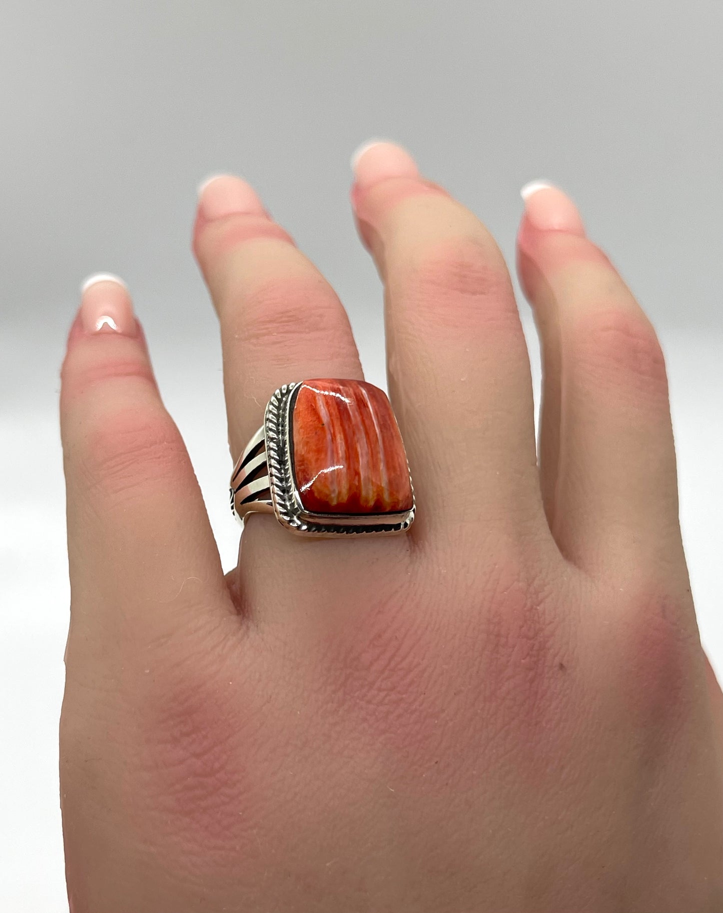 5.0 Red Spiny Oyster Shell Ring by Sheena Jack, Navajo