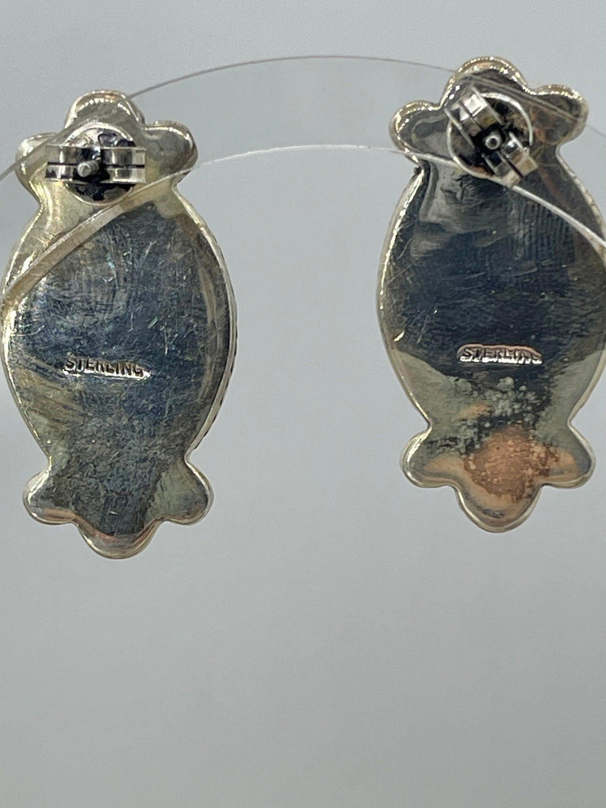 Turquoise Oval Earrings with Silver Embellishments