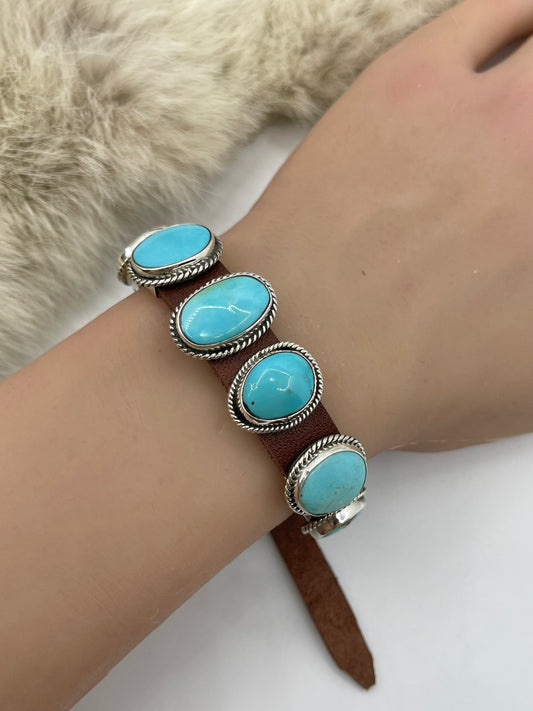 Kingman Turquoise On Leather by Daniel Morgan, Navajo
