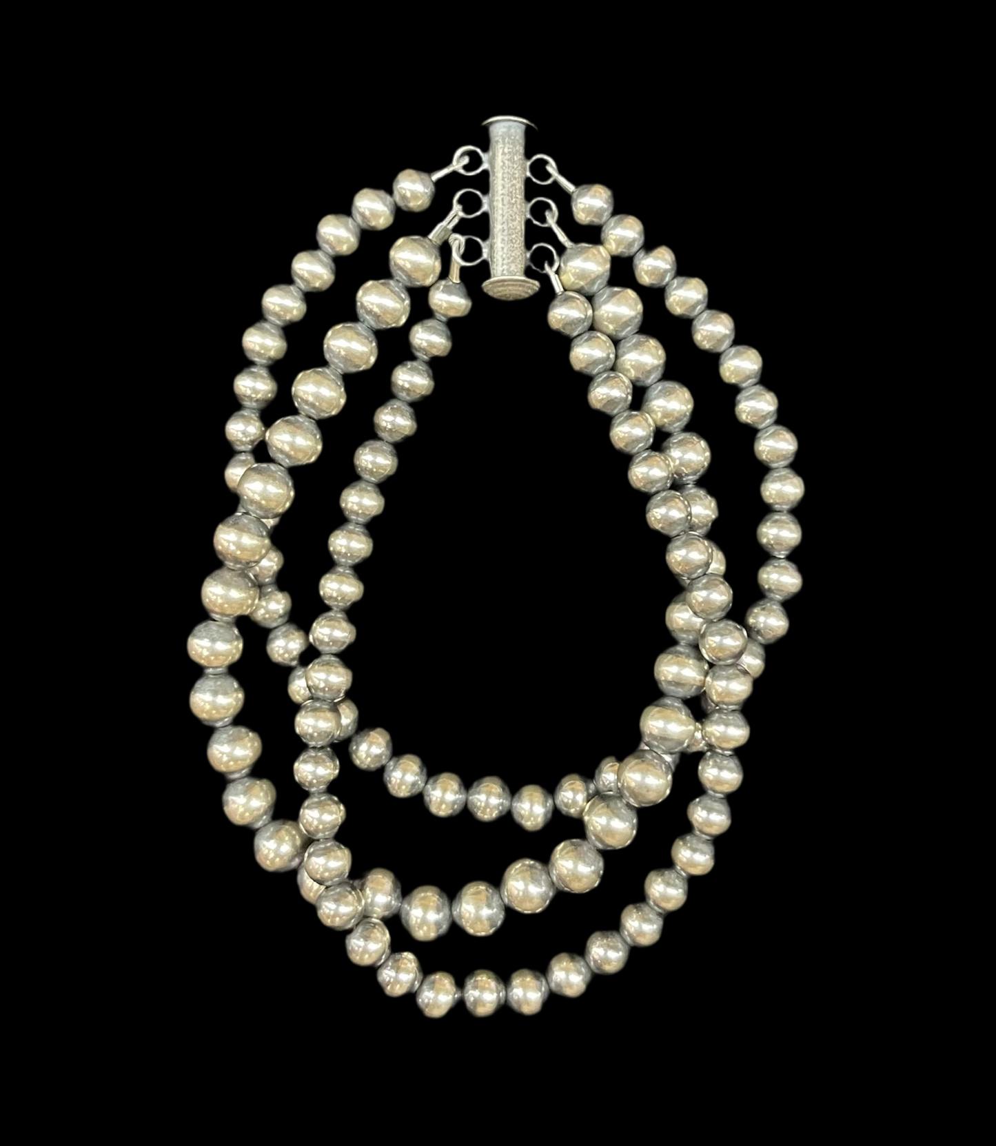 6 3/4" 3 Strand 4mm, and 5mm Navajo Pearl Bracelet