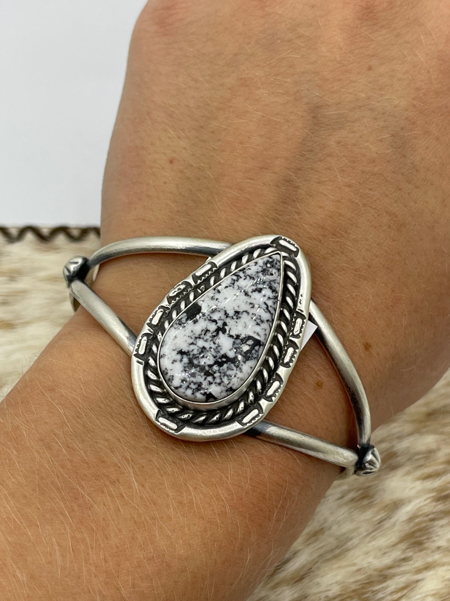 5 1/2"-7 1/2" White Buffalo Teardrop Cuff by Johnny Dixon, Navajo