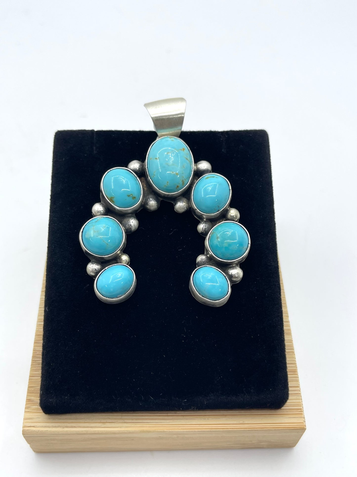 Kingman Turquoise Naja by Augustine Largo, Navajo