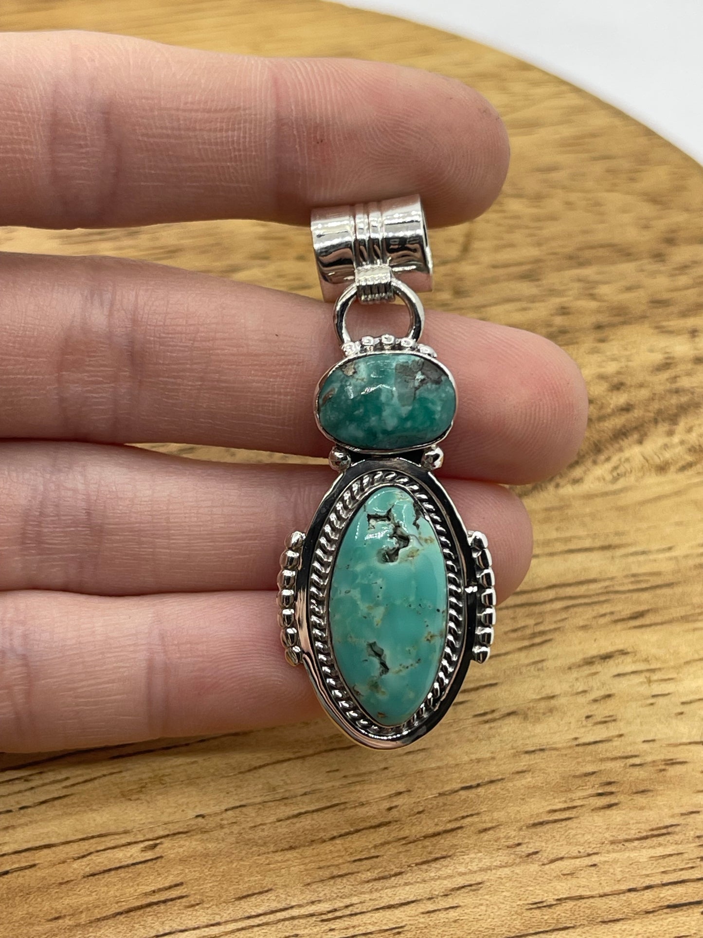 2 Stone Turquoise Oval Pendant with a 7.4mm Bale by Sadie Jim, Navajo (Matrix Varies)