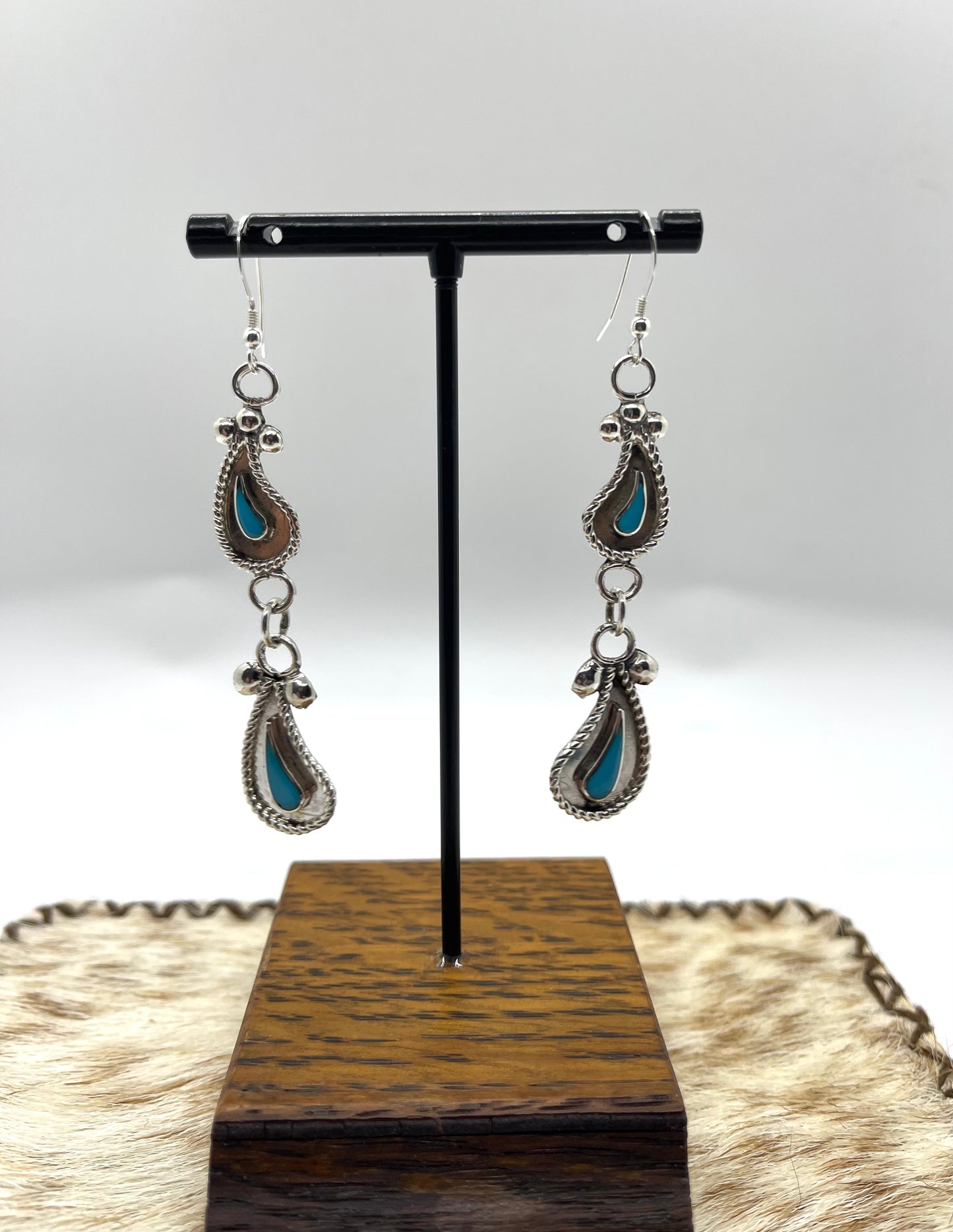 Turquoise and Silver Paisley Dangle Earrings by Gilbert Weebothee, Zuni