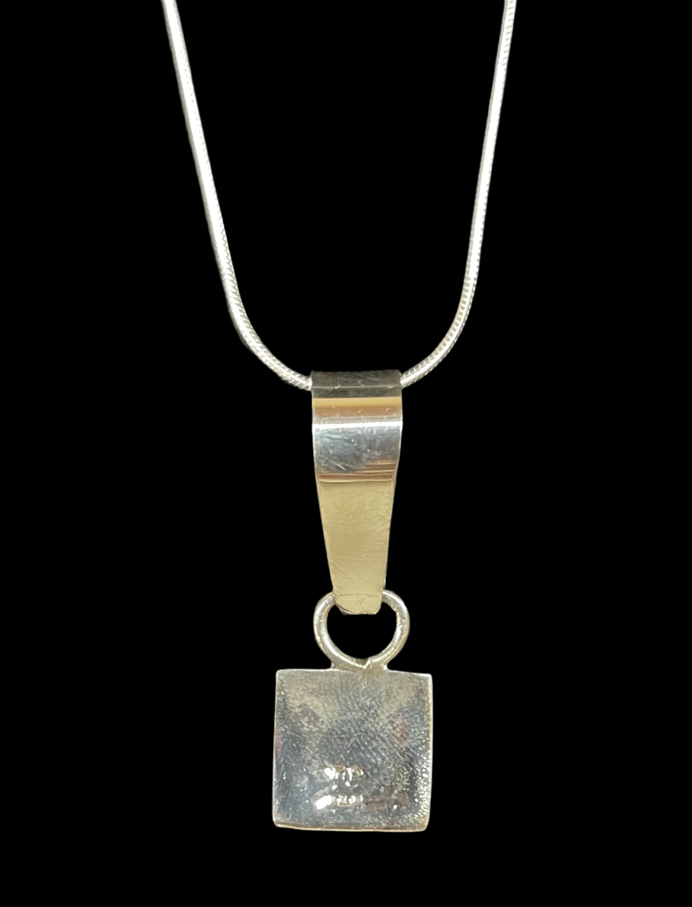 Sterling Silver Pendant by Thomas Charley, Navajo