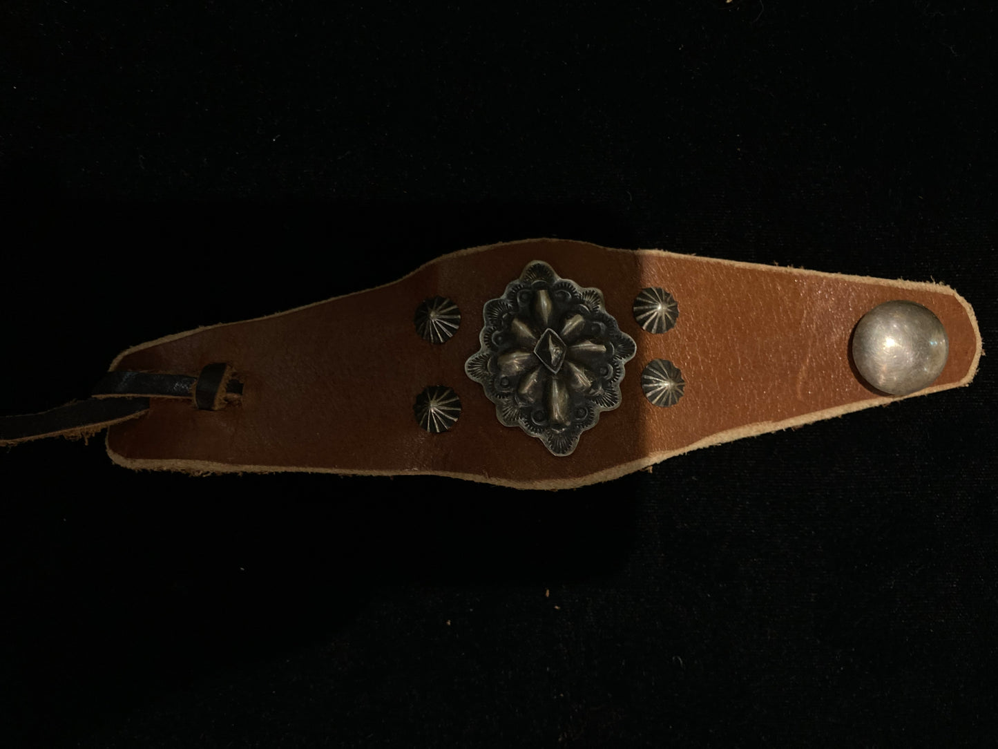 5 1/2"-8 1/2" Leather Bracelet with Sterling Silver Conchos by Danny Martinez, Navajo