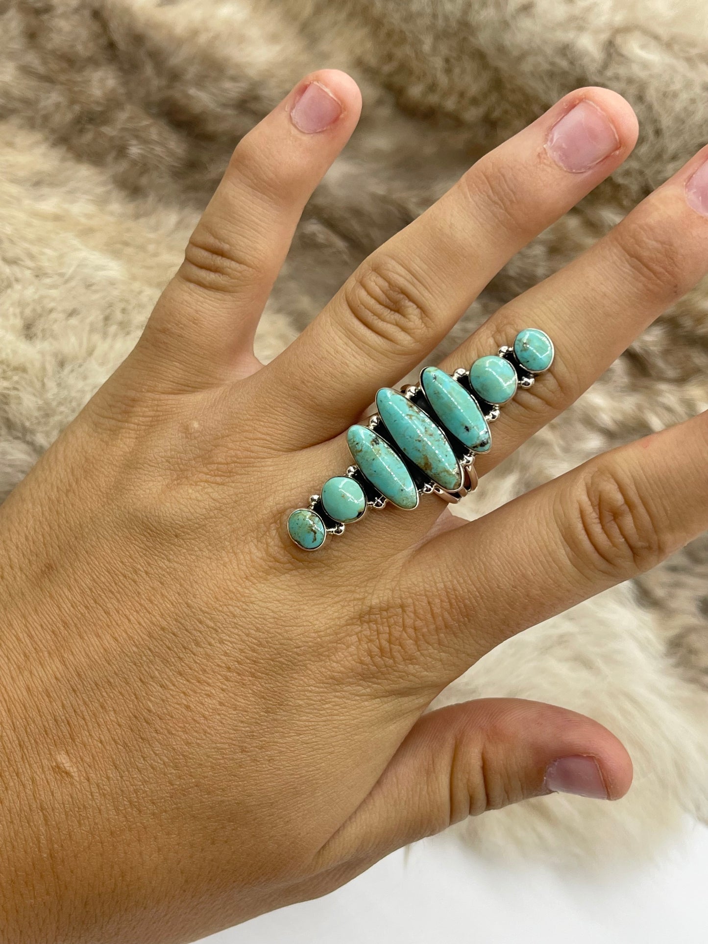 9.0 7 Stone Turquoise Ring by Loretta Delgarito, Navajo
