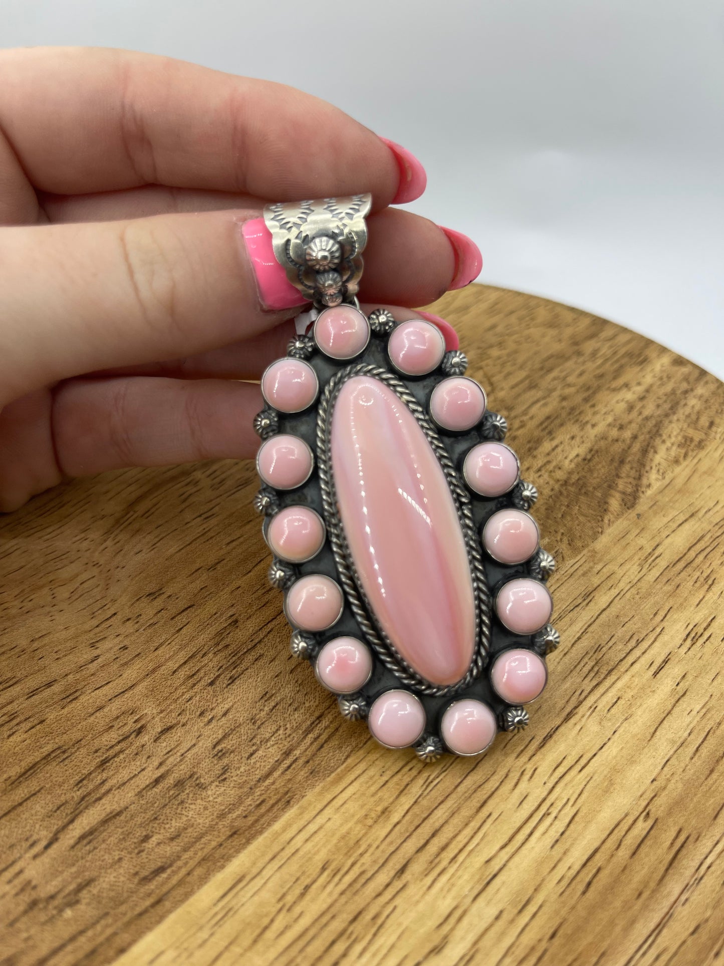 Pink Conch Shell Oval Cluster Pendant by Ned Nez, Navajo