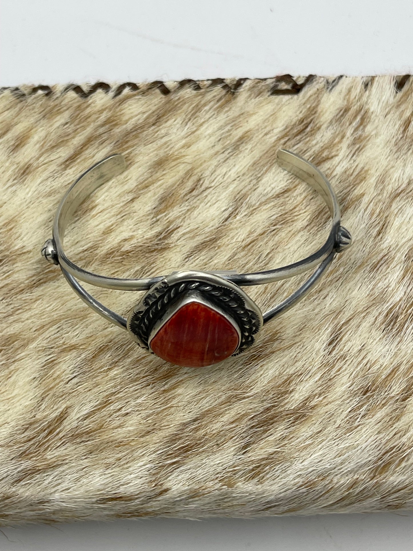 7 3/4"-7 1/4" Teardrop Orange Spiny Oyster Shell Cuff by Augustine Largo, Navajo