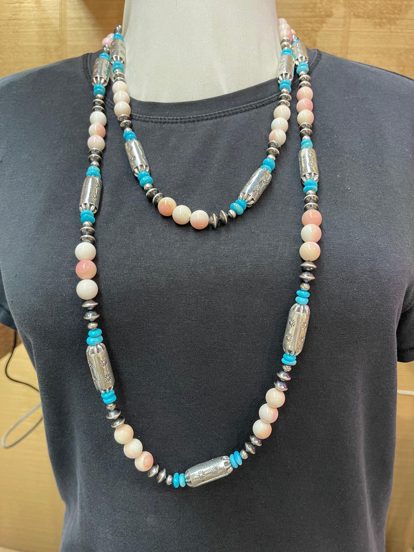 60" Stamped Barrel Beads, Pink Conch Shell Beads, Navajo Style Saucers, and Sleeping Beauty Turquoise Beads
