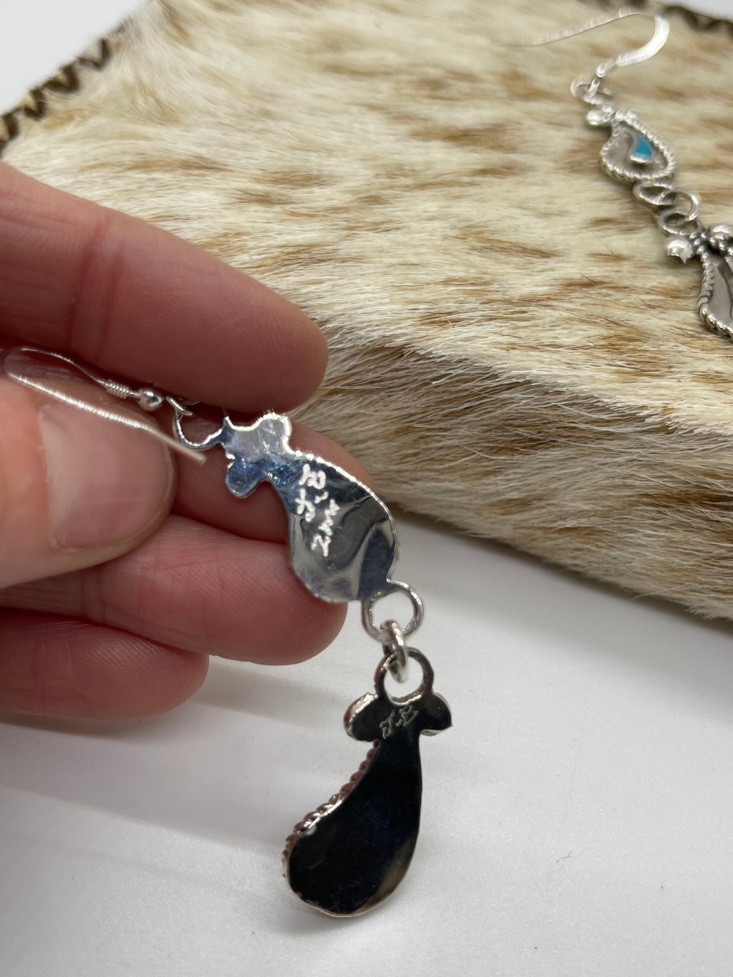 Turquoise and Silver Paisley Dangle Earrings by Gilbert Weebothee, Zuni
