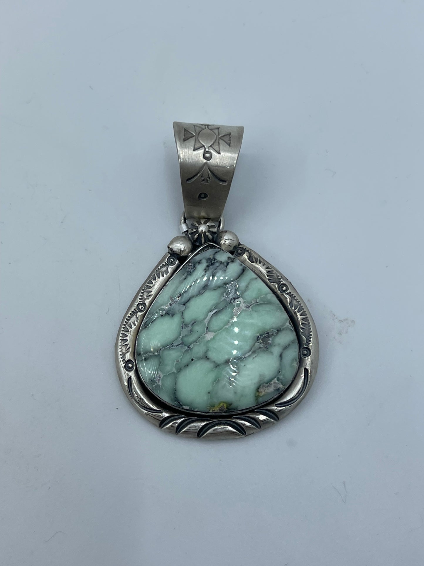 Palomino Turquoise Pendant by J. Piaso, Jr., Navajo