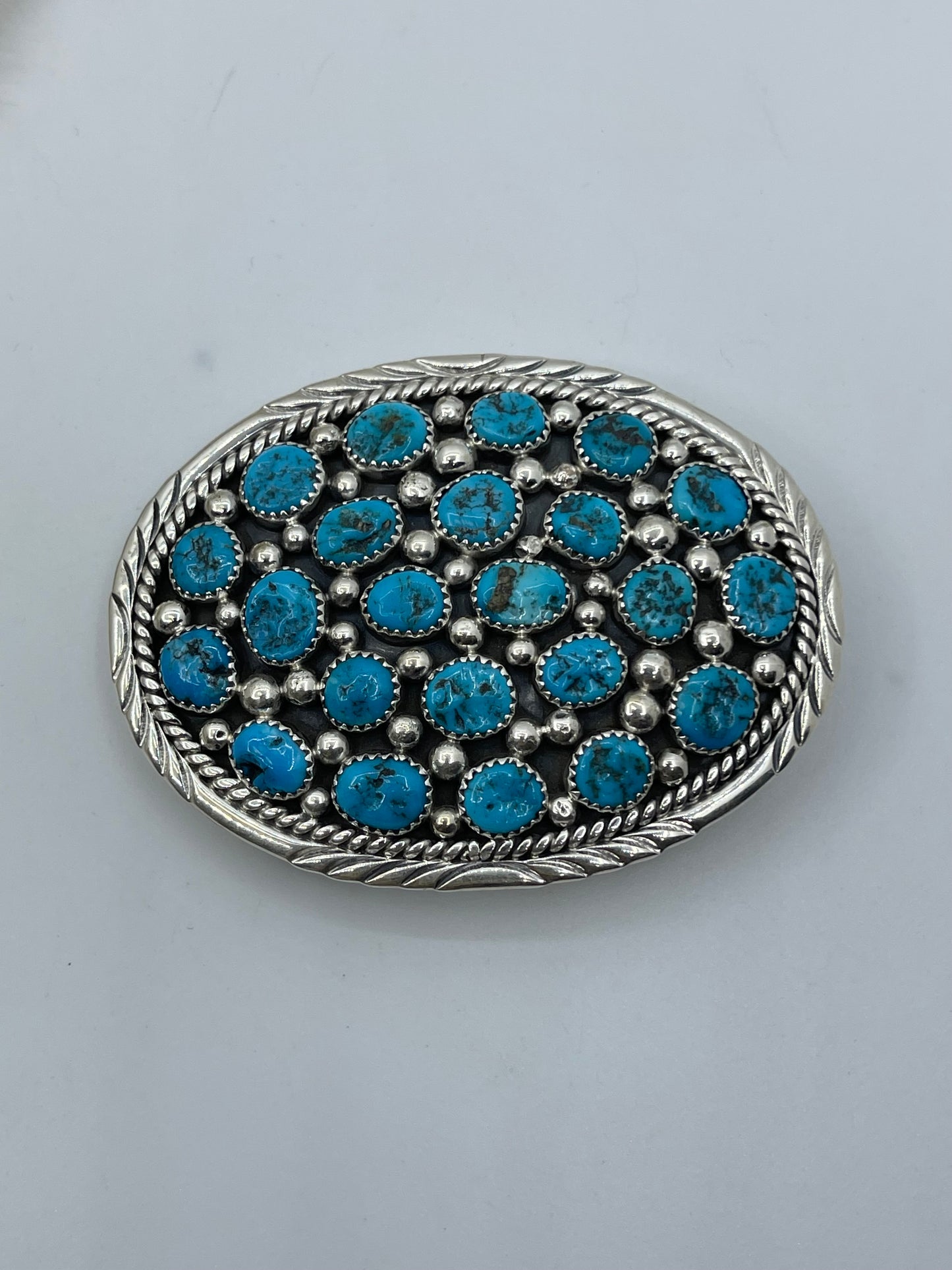 23 Stone Sleeping Beauty Turquoise Belt Buckle by O. Charley, Navajo