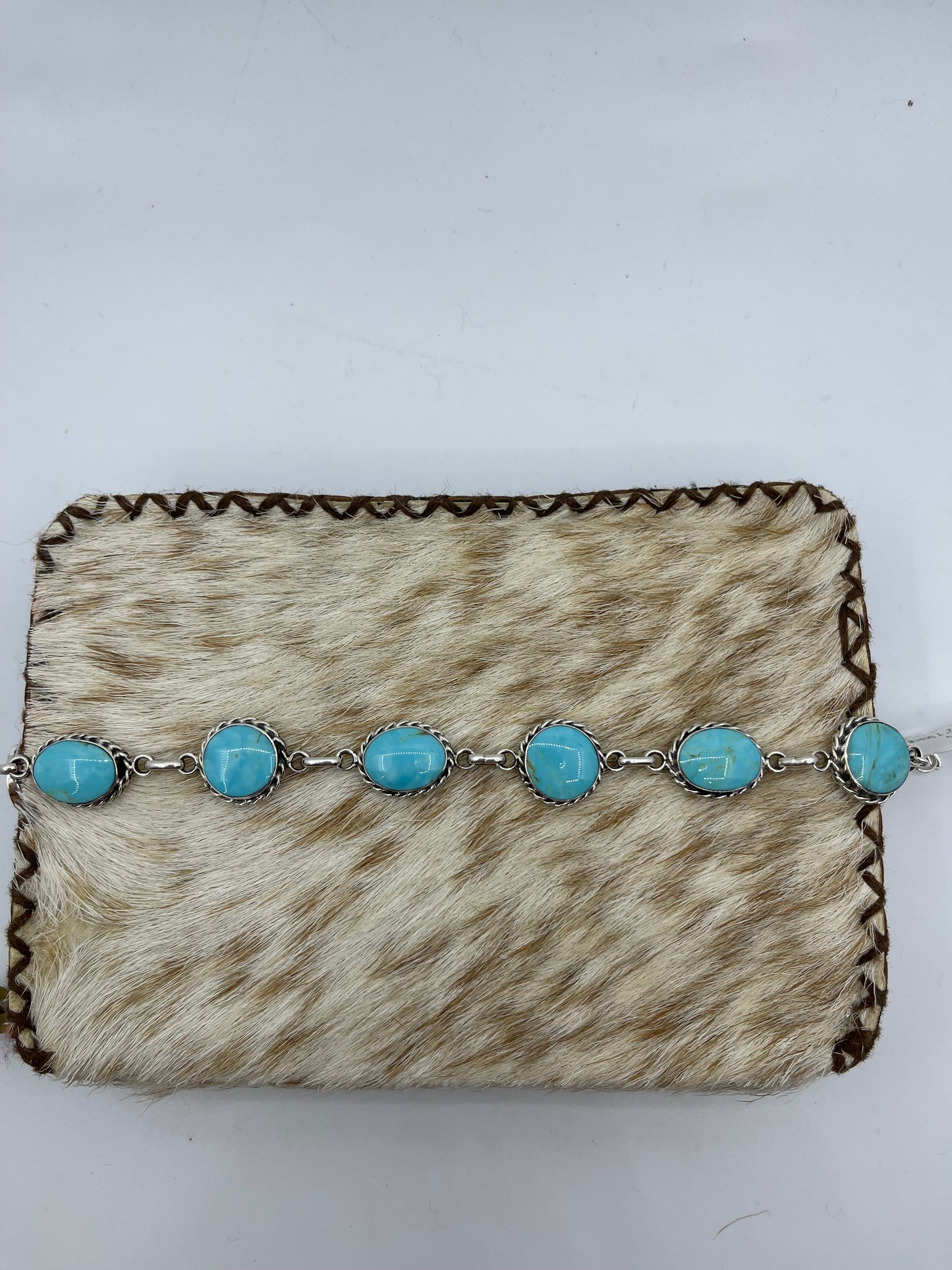 7 1/2"-9 1/2" 7 Stone Turquoise Linked Bracelet by Arlene Lewis, Navajo