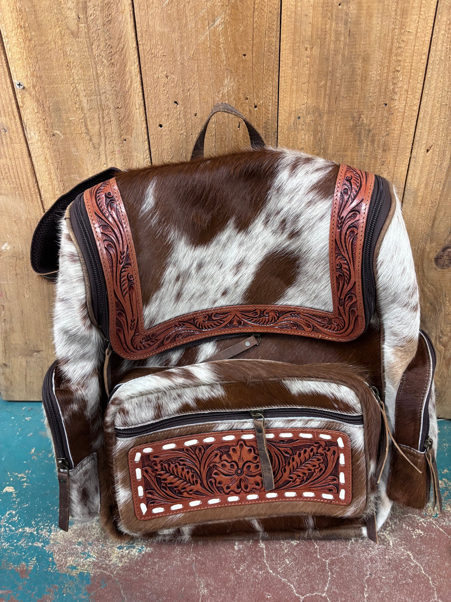Red and White Cowhide Brown Tooled Leather Backpack