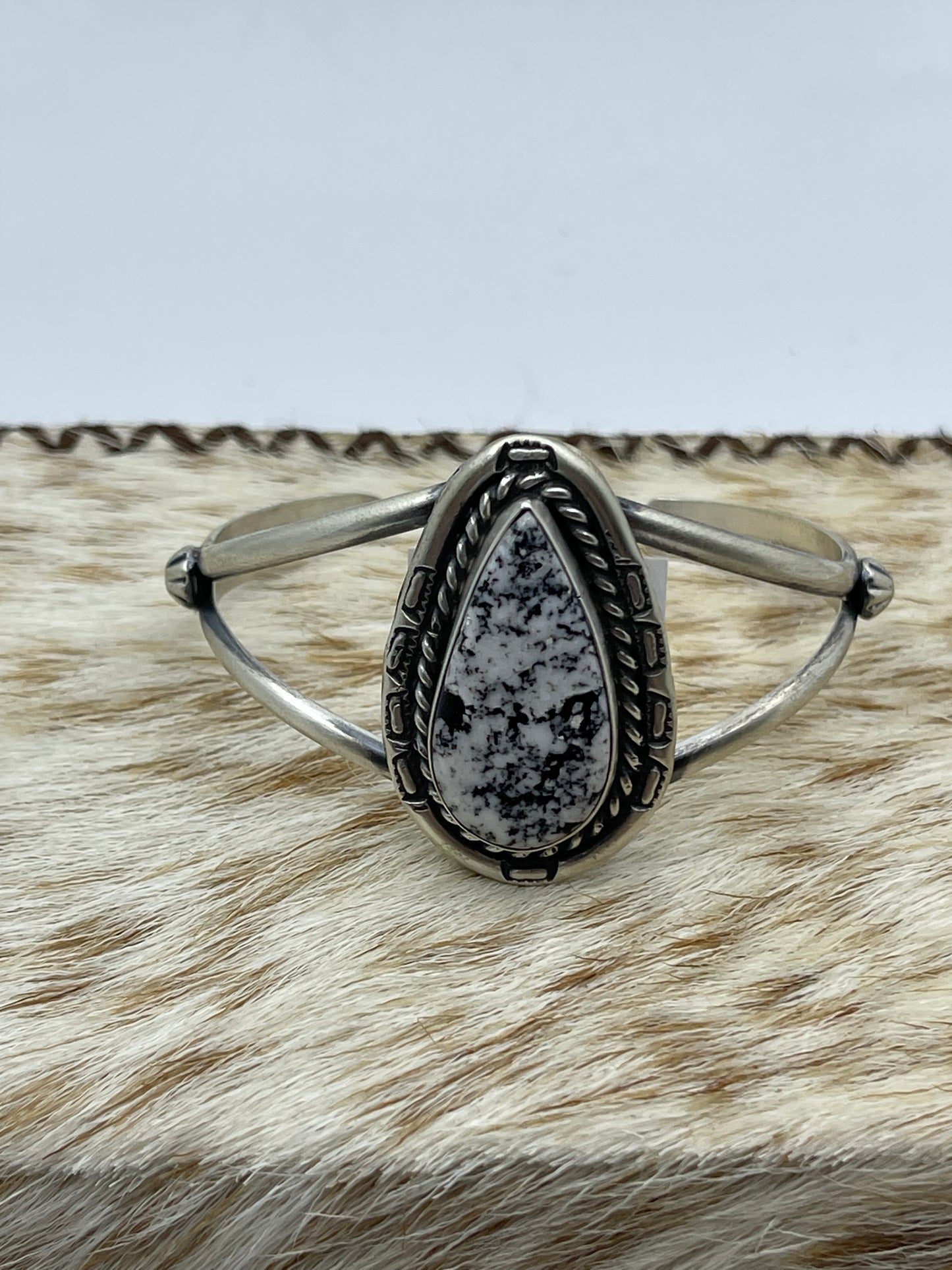 5 1/2"-7 1/2" White Buffalo Teardrop Cuff by Johnny Dixon, Navajo