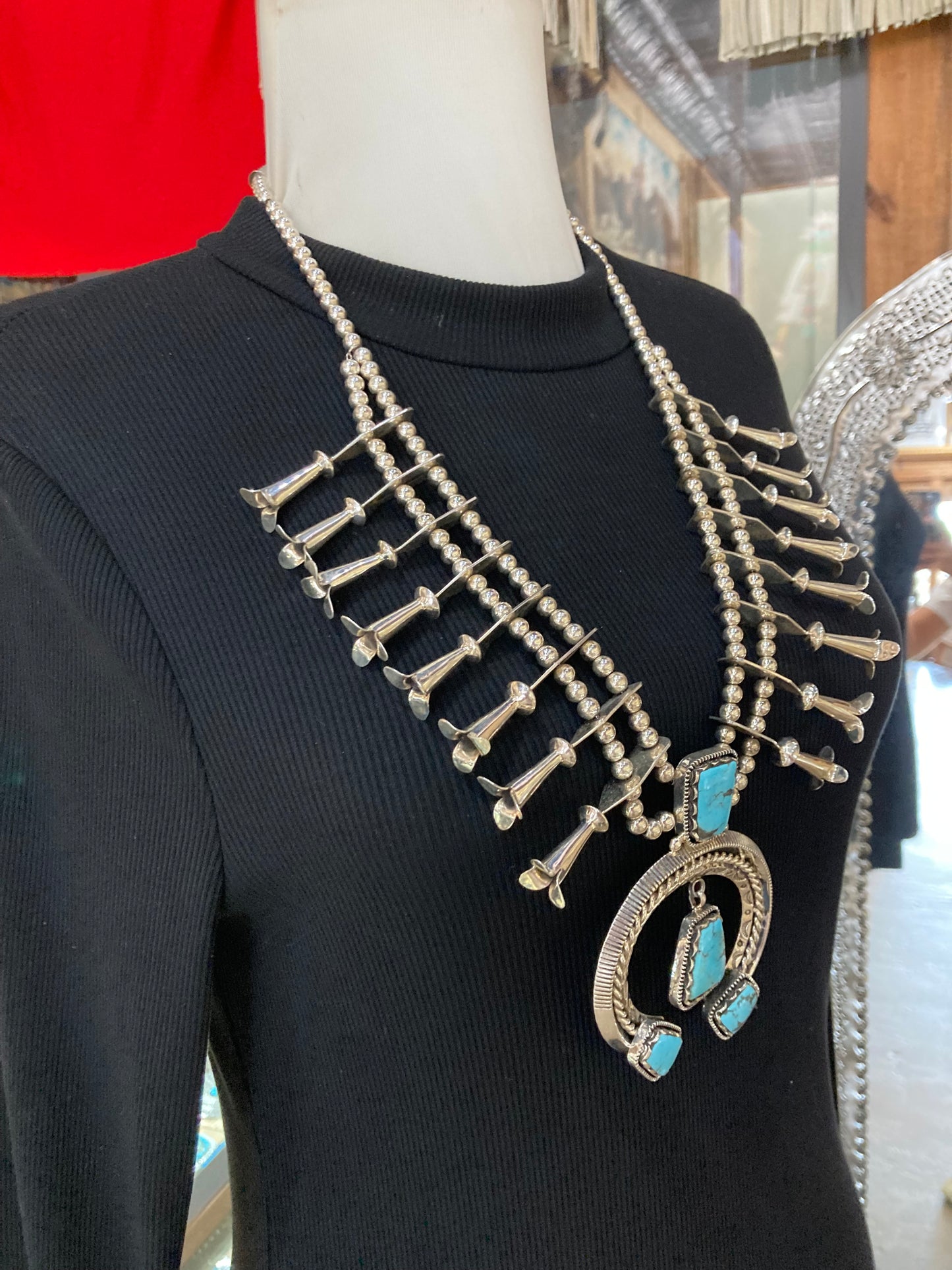 24" Blue Turquoise High Shine Squash Blossom by Emerson Delgarito, Navajo