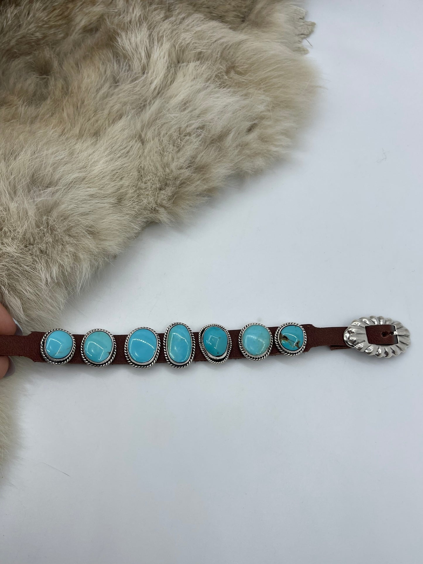 Kingman Turquoise On Leather by Daniel Morgan, Navajo