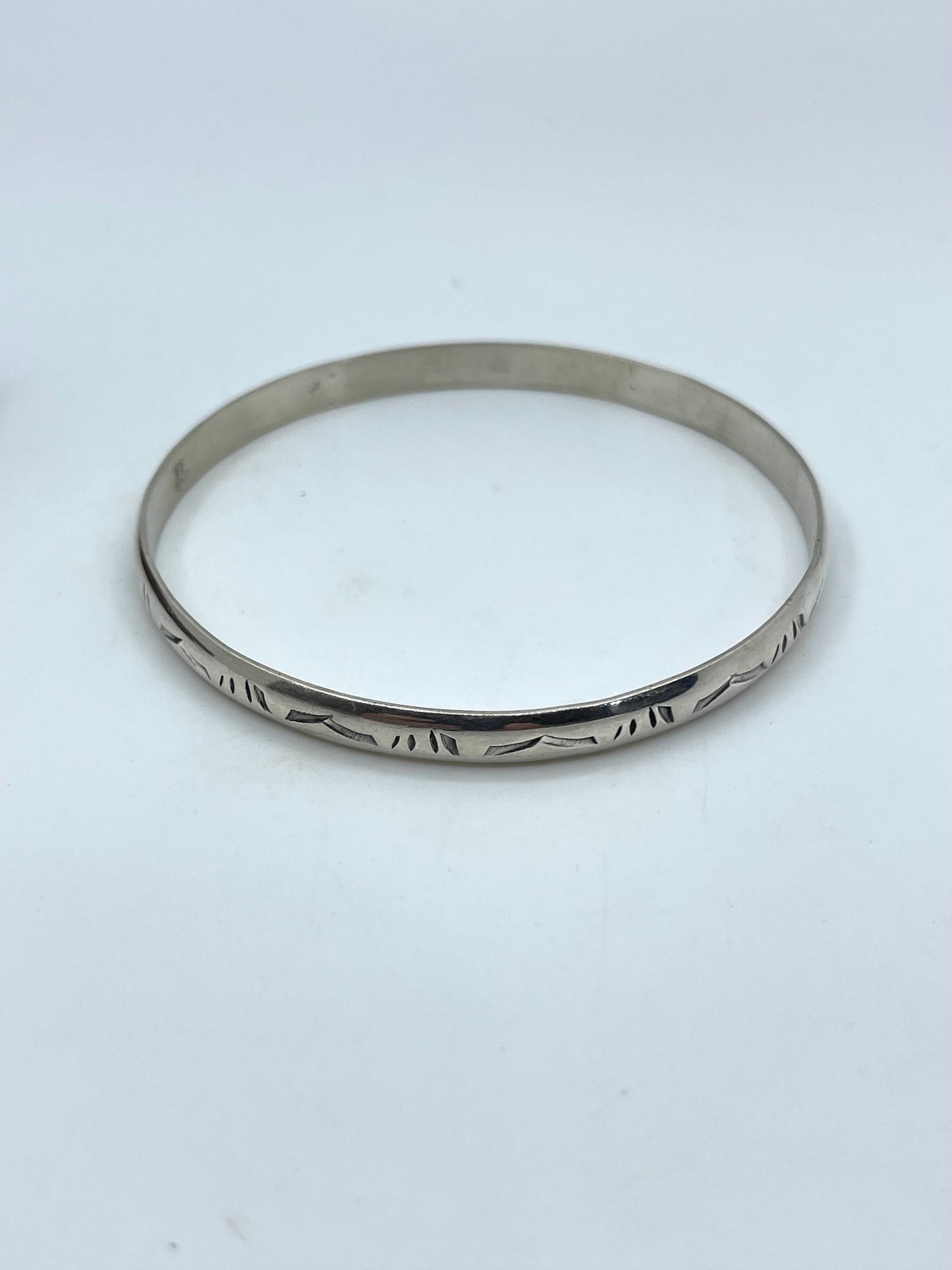 8.25” Stamped Wire Bangle by Elaine Tahe, Navajo