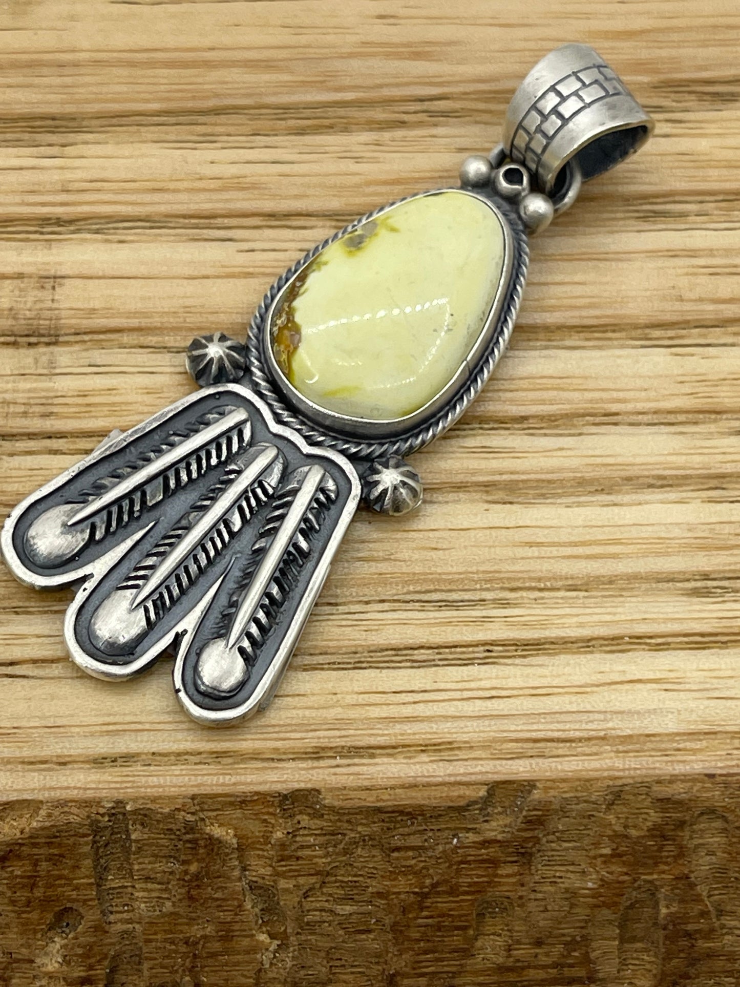 LOT 84 A 11/2 Palomino Turquoise Pendant with Feathers by Marita Benally, Navajo