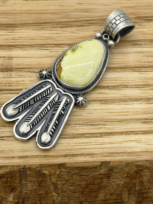 LOT 84 A 11/2 Palomino Turquoise Pendant with Feathers by Marita Benally, Navajo