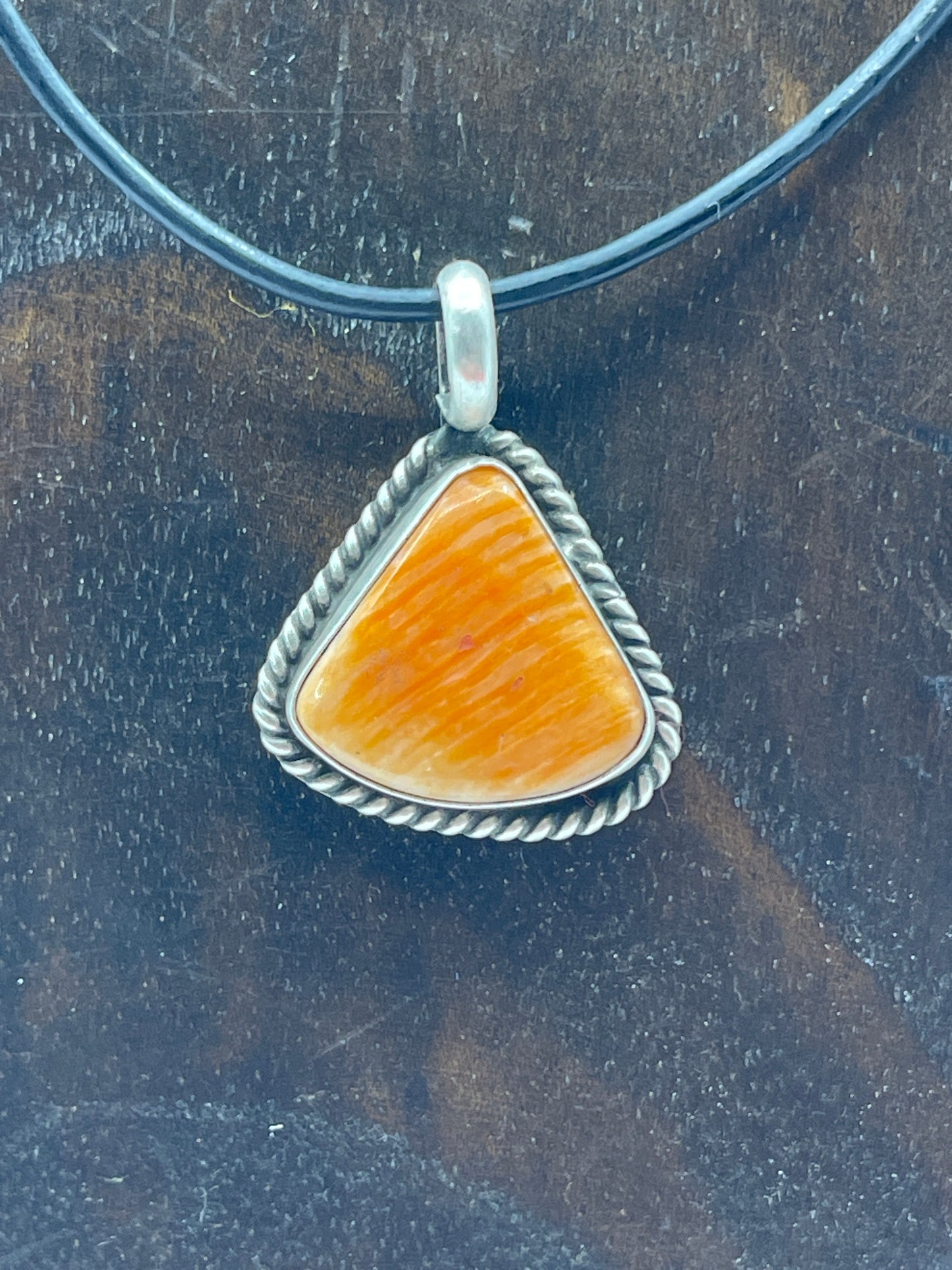 Orange Spiny Oyster Shell on Black Leather Cord by Johnny Dixon , Navajo