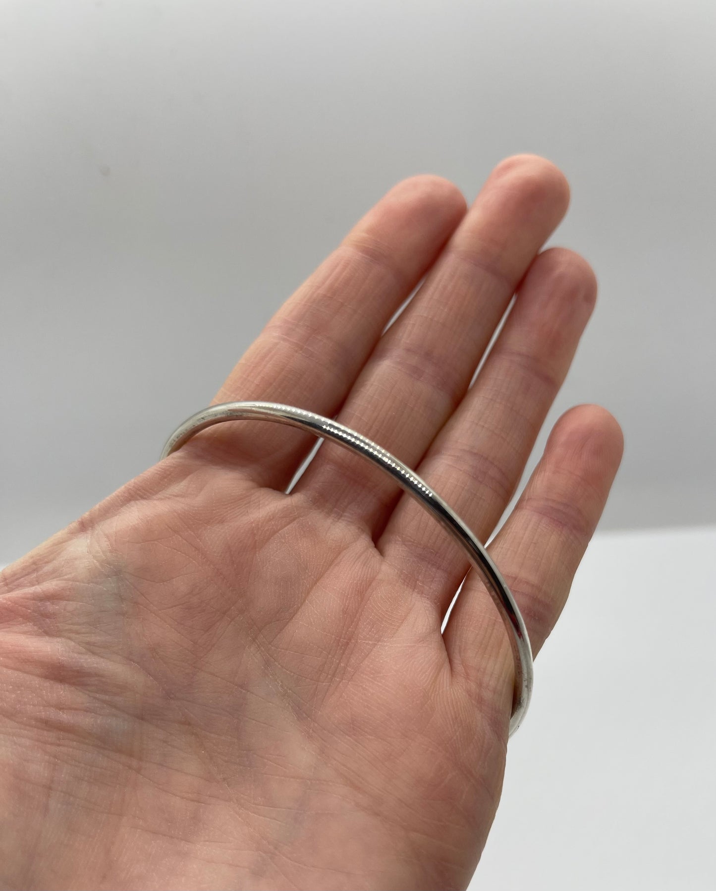 8" Plain Sterling Silver Bangle by Elaine Tahe, Navajo