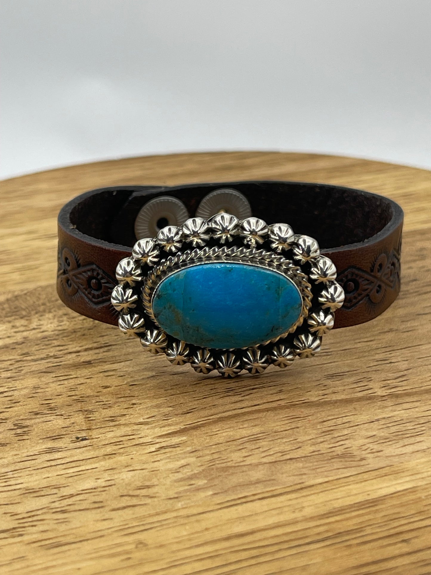 Kingman Turquoise On Stamped Leather by Suzanna Johnson, Navajo