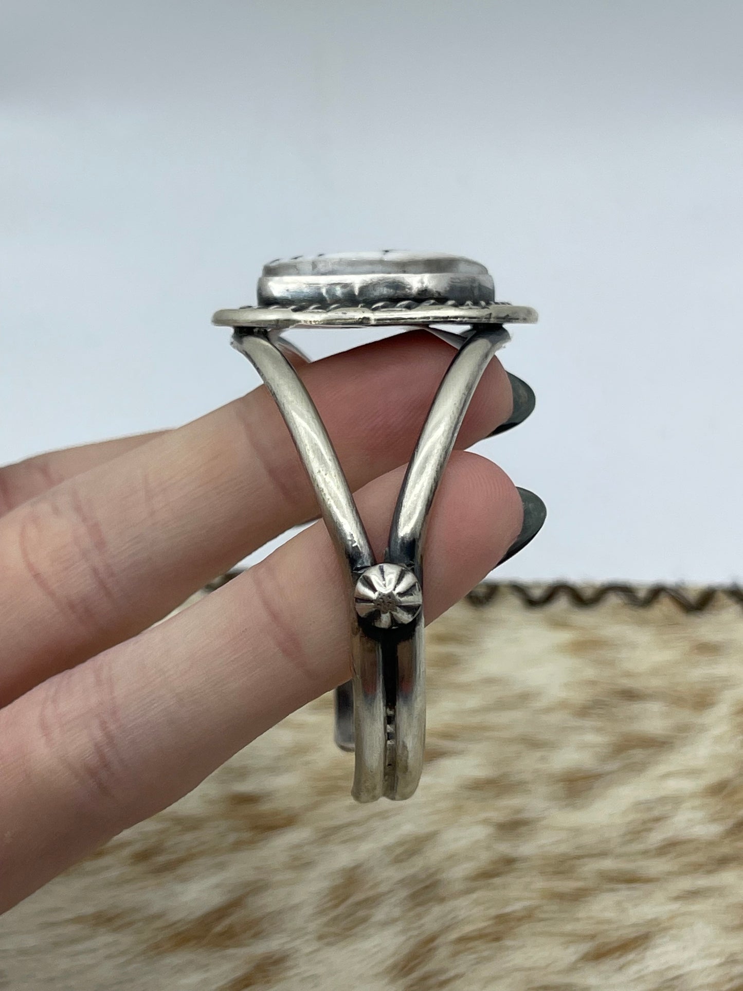 5 1/2"-7 1/2" White Buffalo Triangle Cuff by Johnny Dixon, Navajo