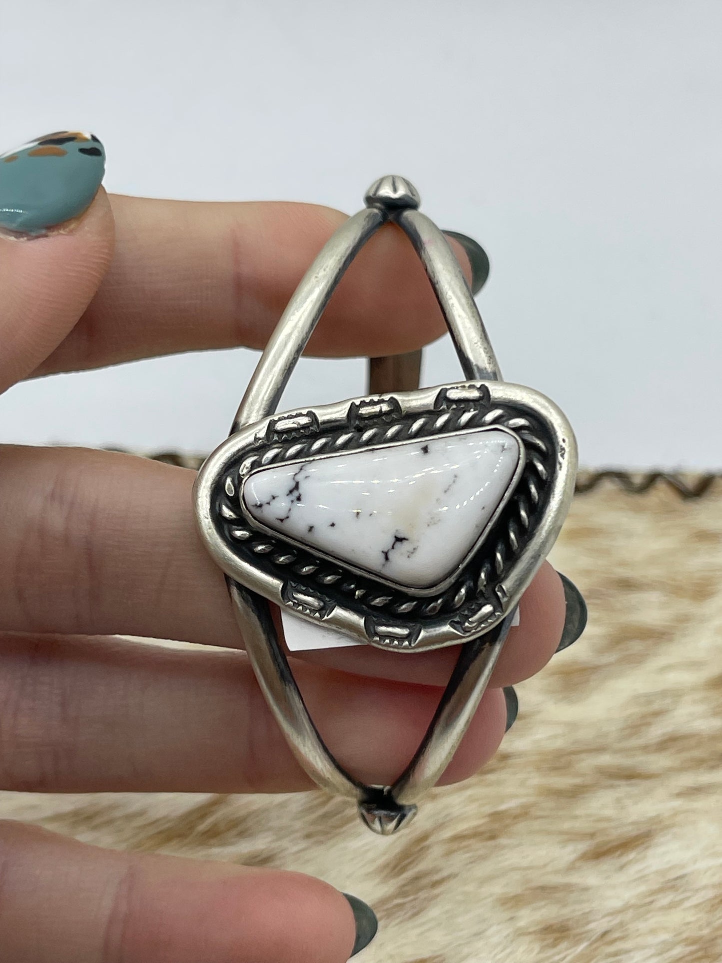 5 1/2"-7 1/2" White Buffalo Triangle Cuff by Johnny Dixon, Navajo