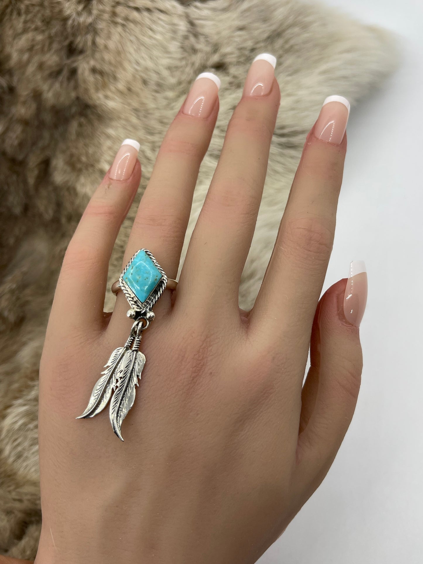 7.0 Turquoise Ring with Feathers by Jerome Lee, Navajo