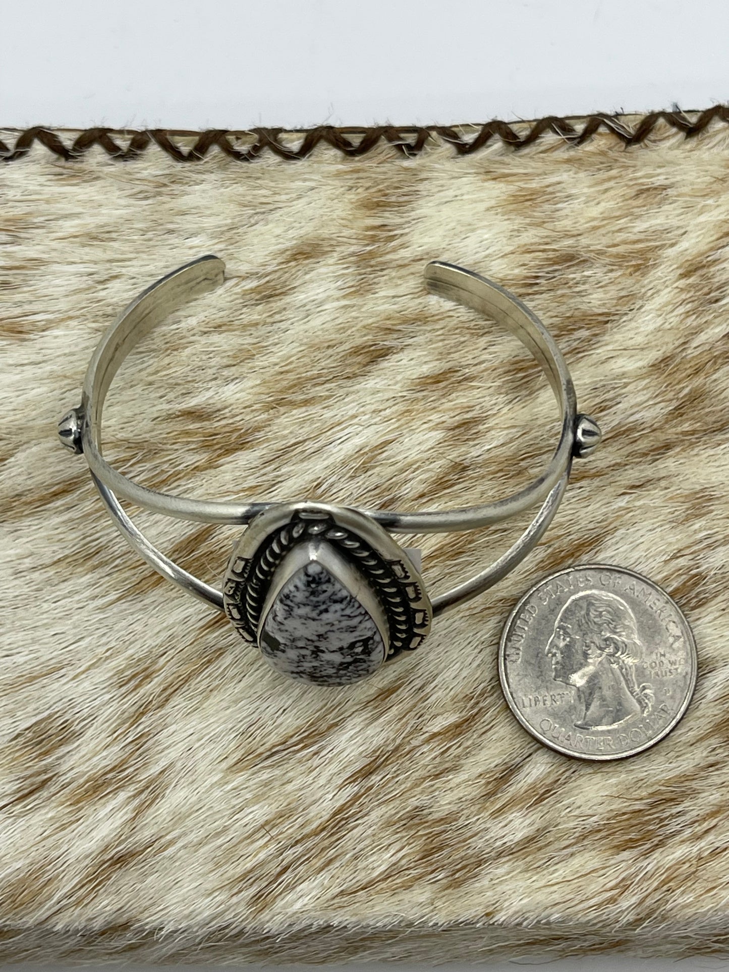 5 1/2"-7 1/2" White Buffalo Teardrop Cuff by Johnny Dixon, Navajo