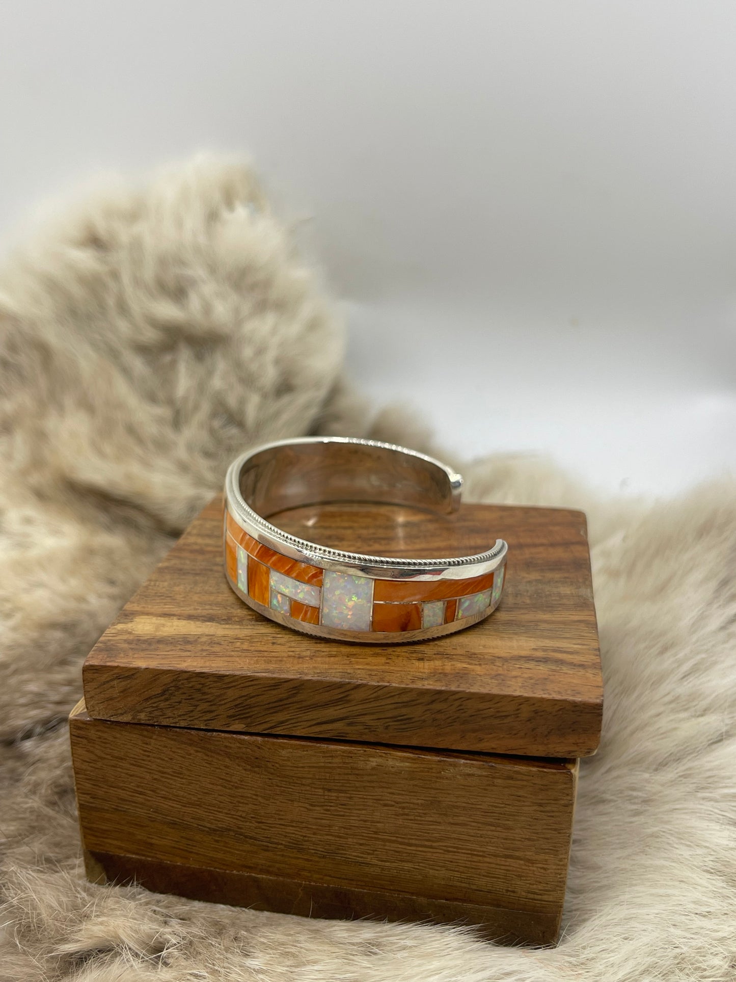 6.5" Orange Spiny & White Opal Inlay by Glendora Boogua
