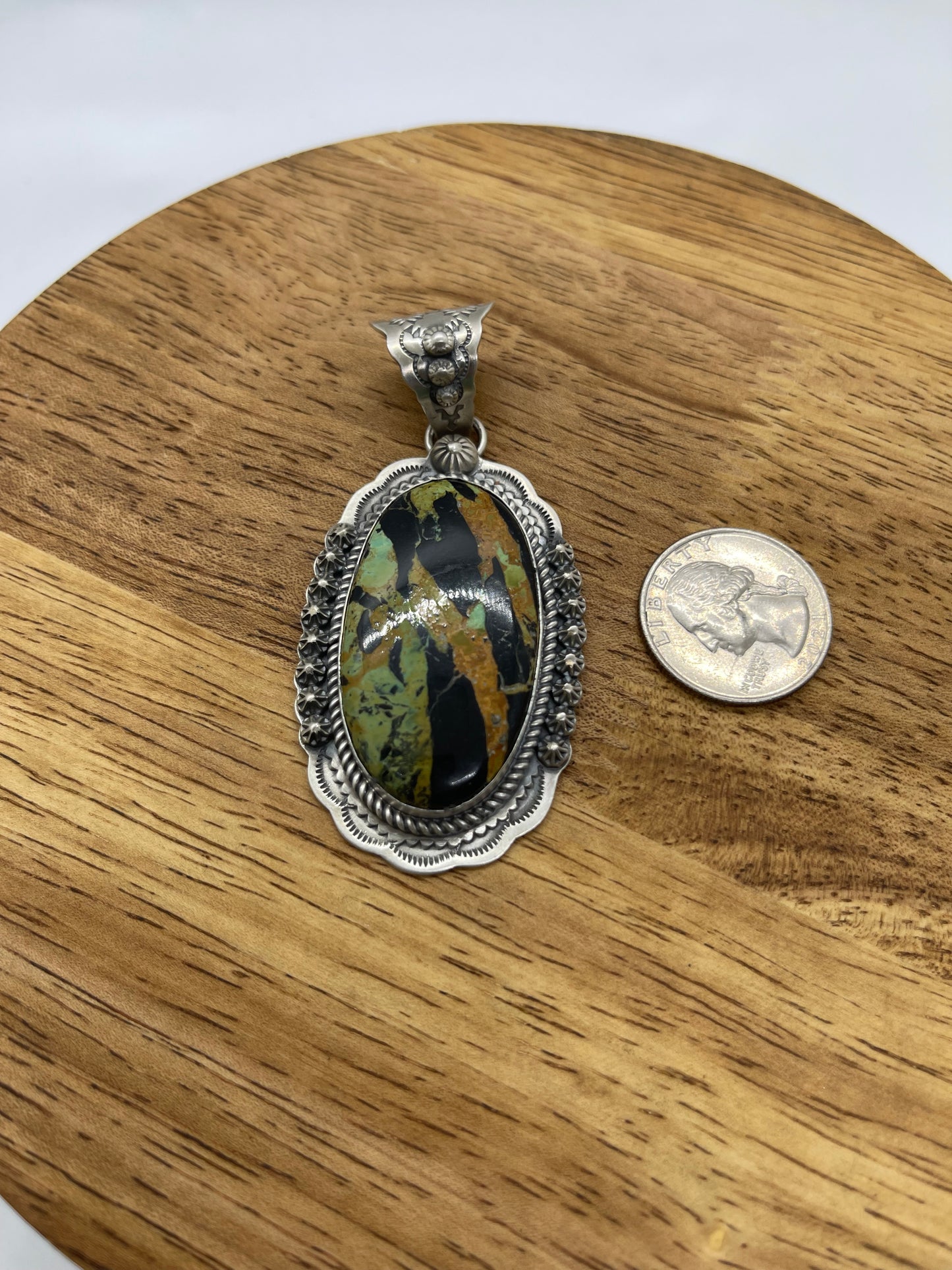Black Jack Turquoise Oval Pendant with a 11.5mm Bale by Gilbert Platero, Navajo