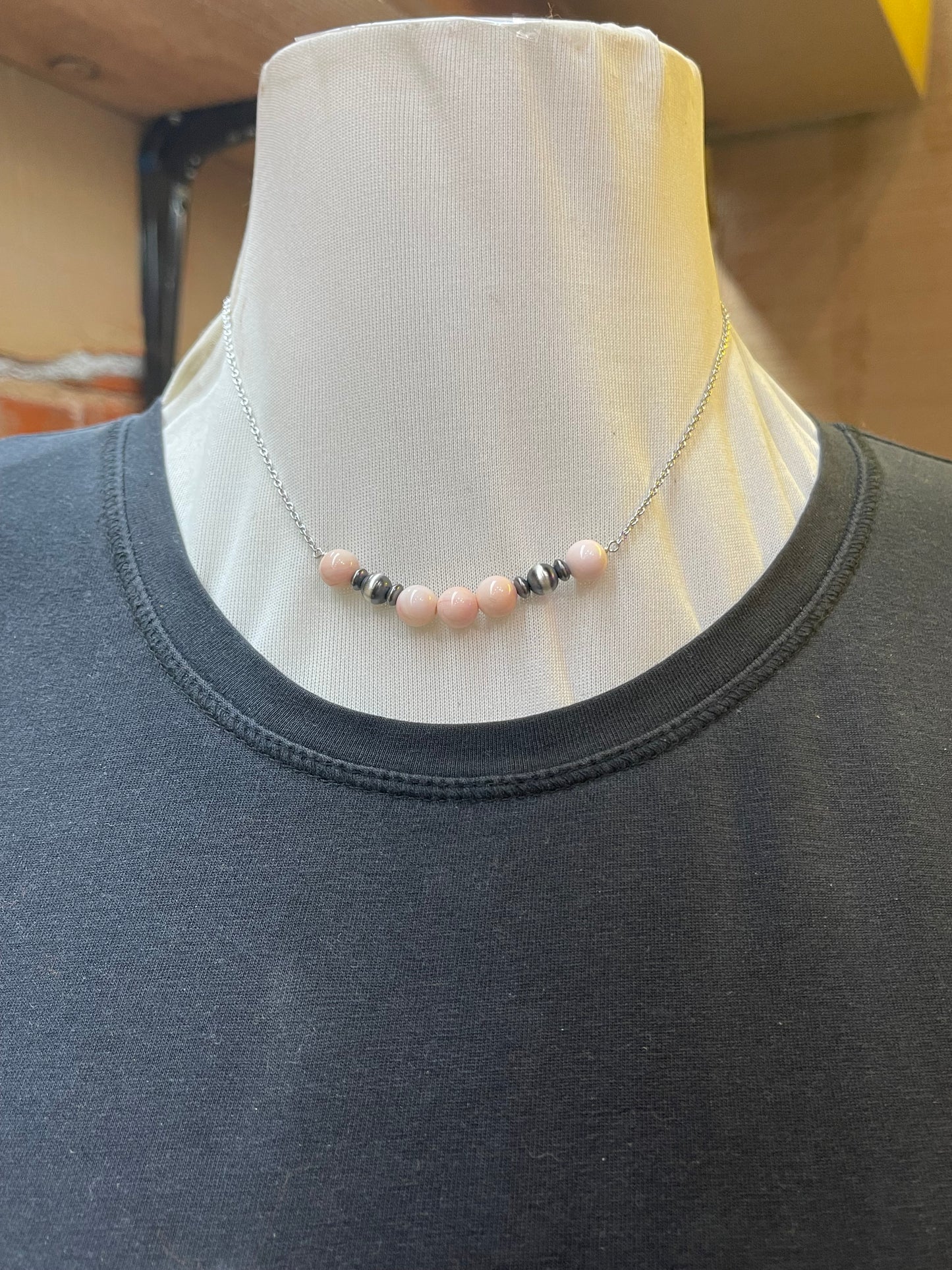 Pink Conch and Navajo Pearls