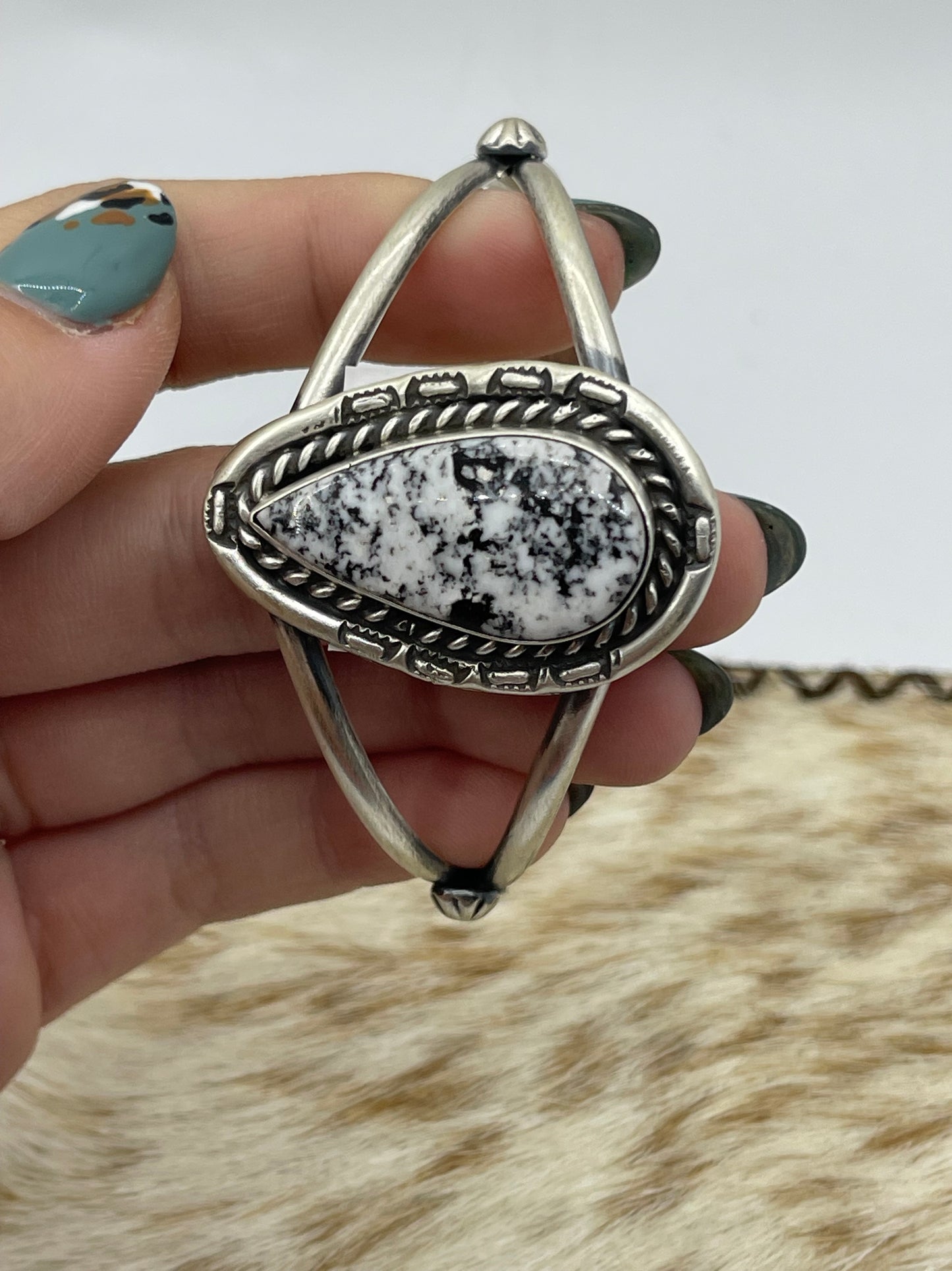 5 1/2"-7 1/2" White Buffalo Teardrop Cuff by Johnny Dixon, Navajo