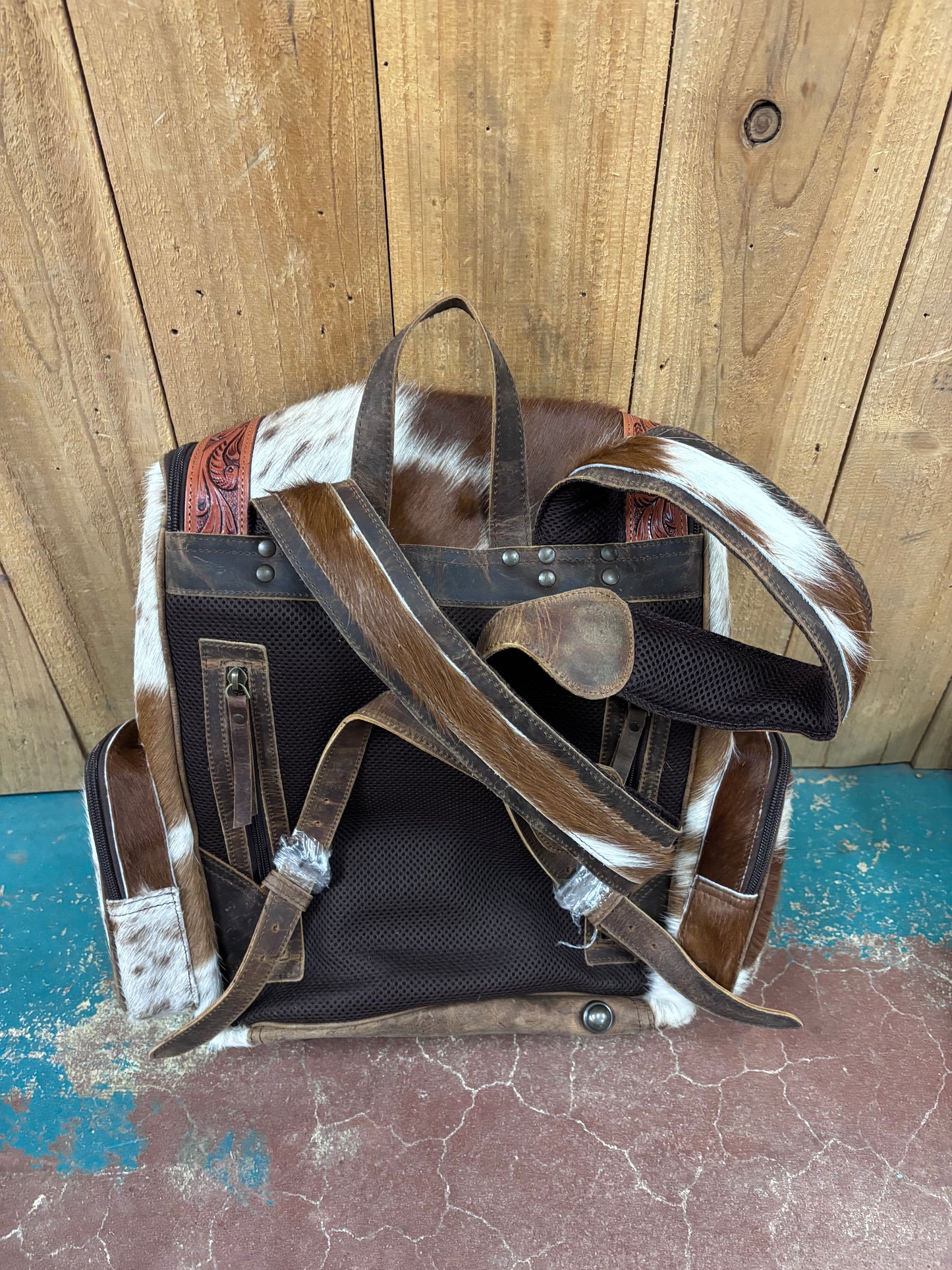 Red and White Cowhide Brown Tooled Leather Backpack