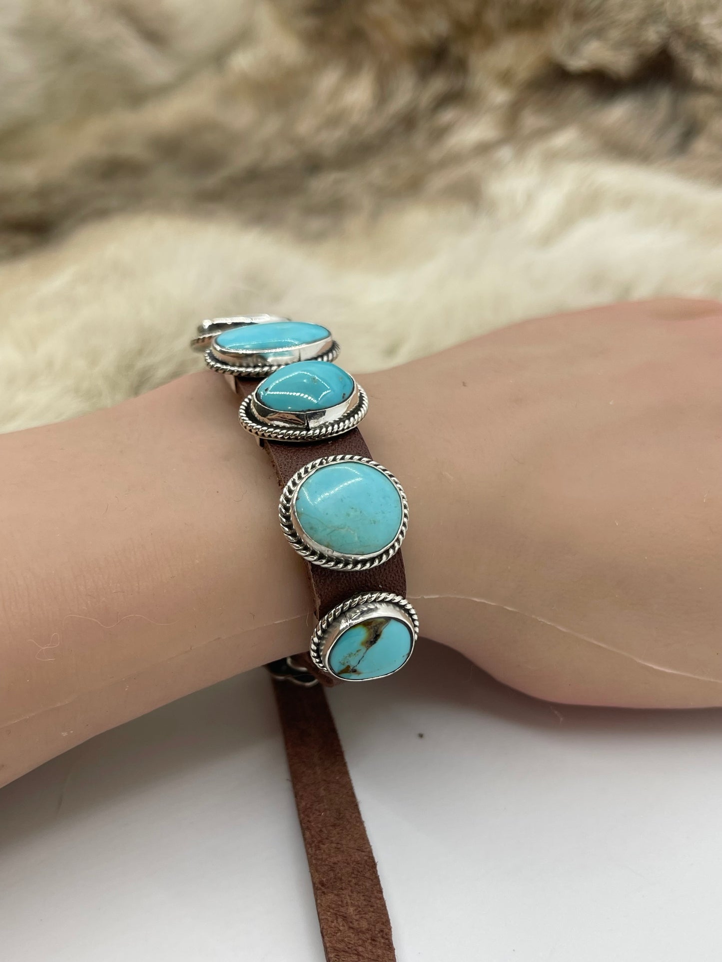Kingman Turquoise On Leather by Daniel Morgan, Navajo