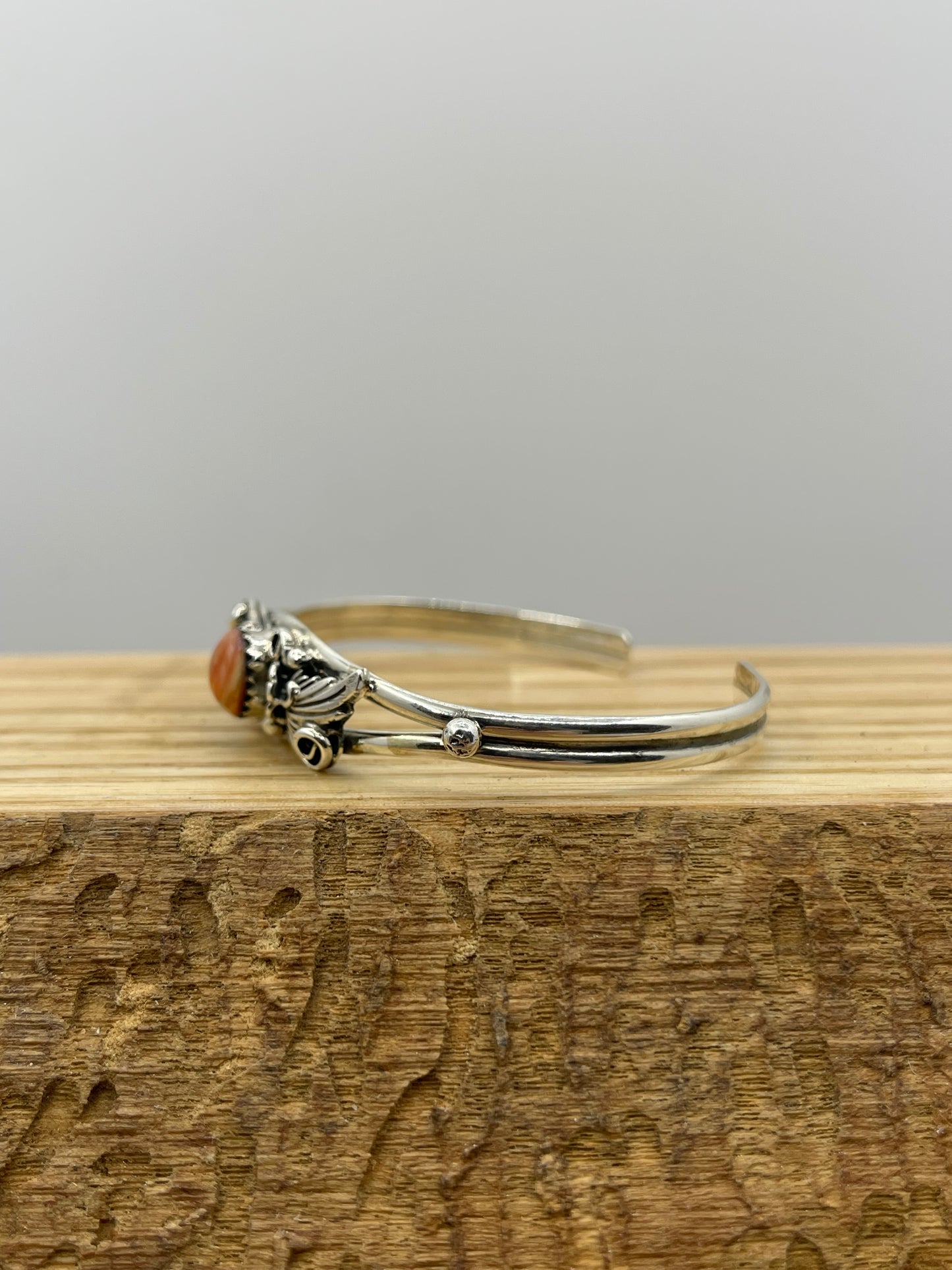 Orange Spiney Flower Cuff "6-6 1/2"