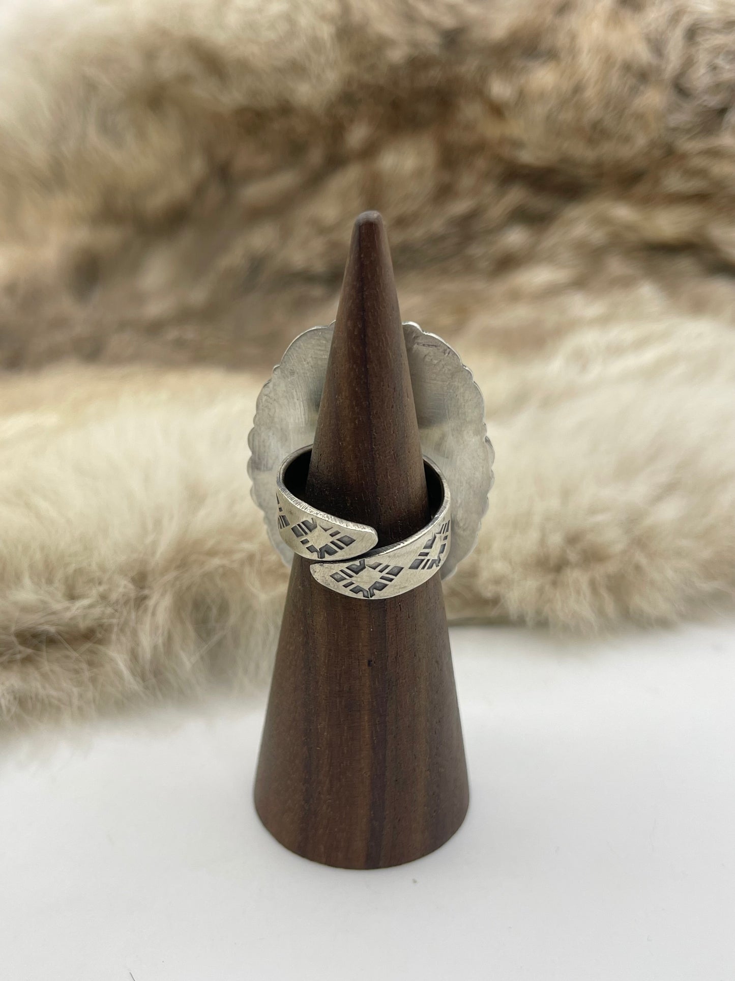 LOT 24 C 9/6 Adjustable 7.0-10.0 White Buffalo Ring with Stamped "L" by Artist