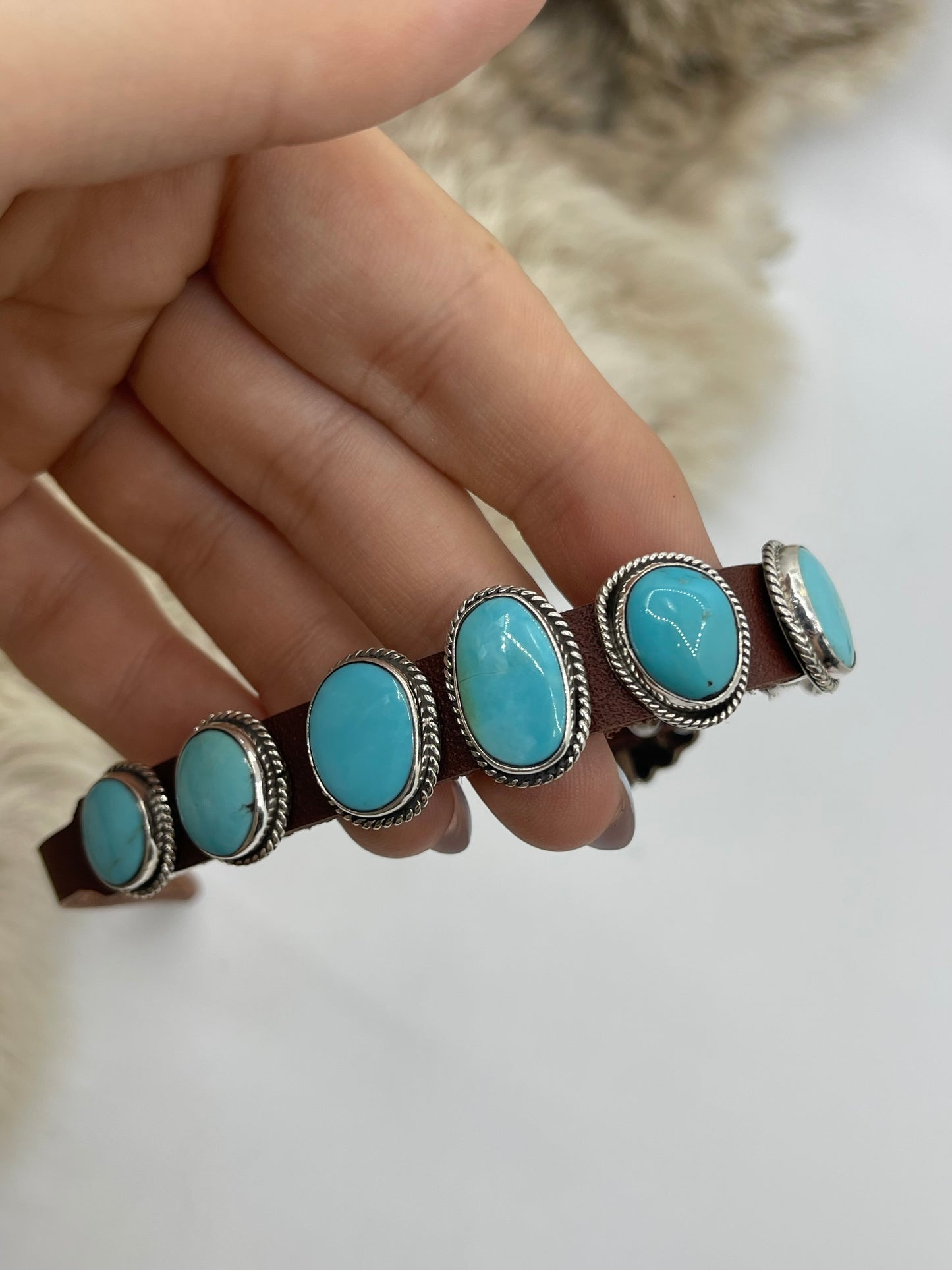 Kingman Turquoise On Leather by Daniel Morgan, Navajo