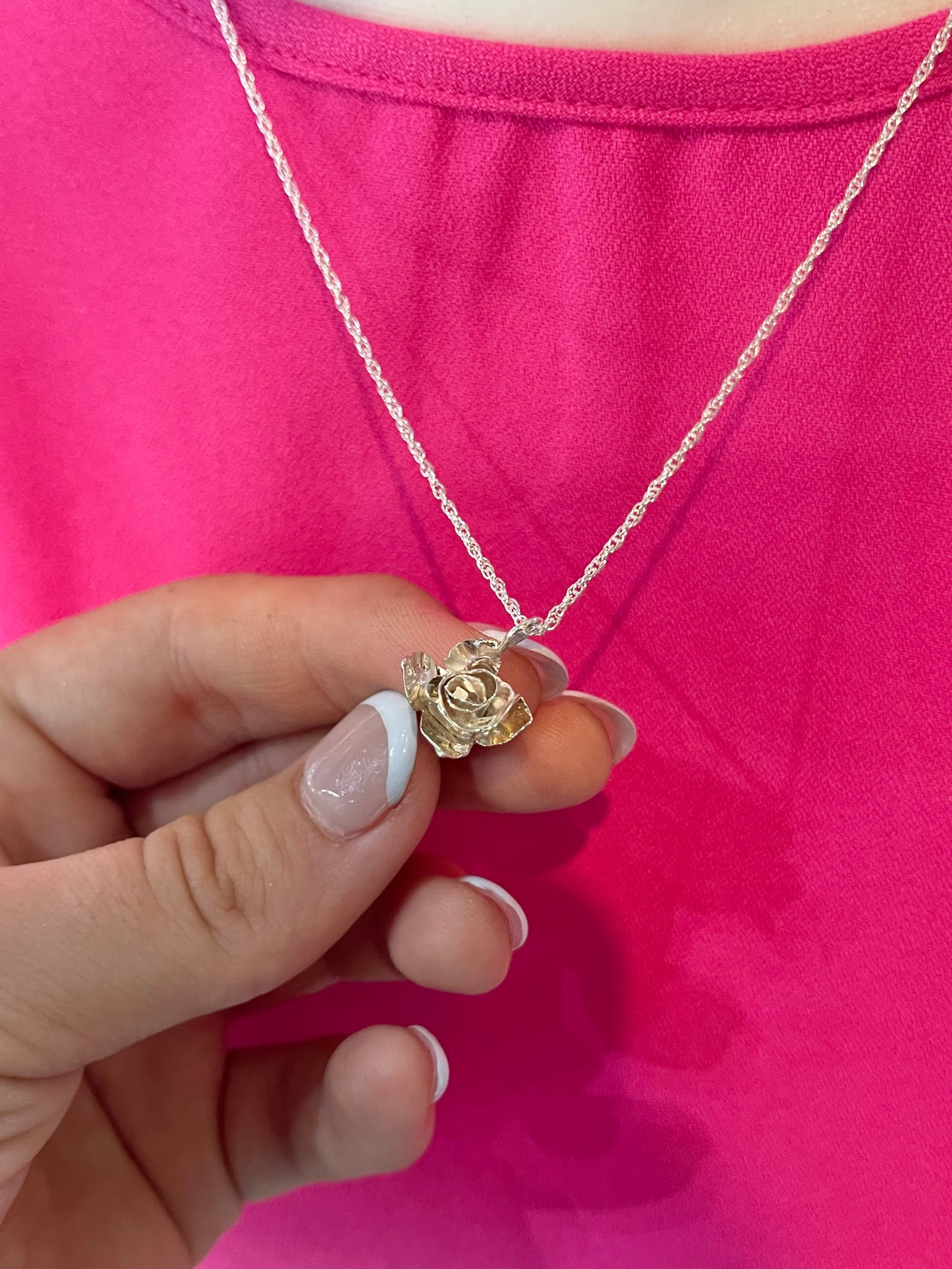 18" SILVER ROSE PENDANT BY ROBBIE SANCHEZ, ZUNI