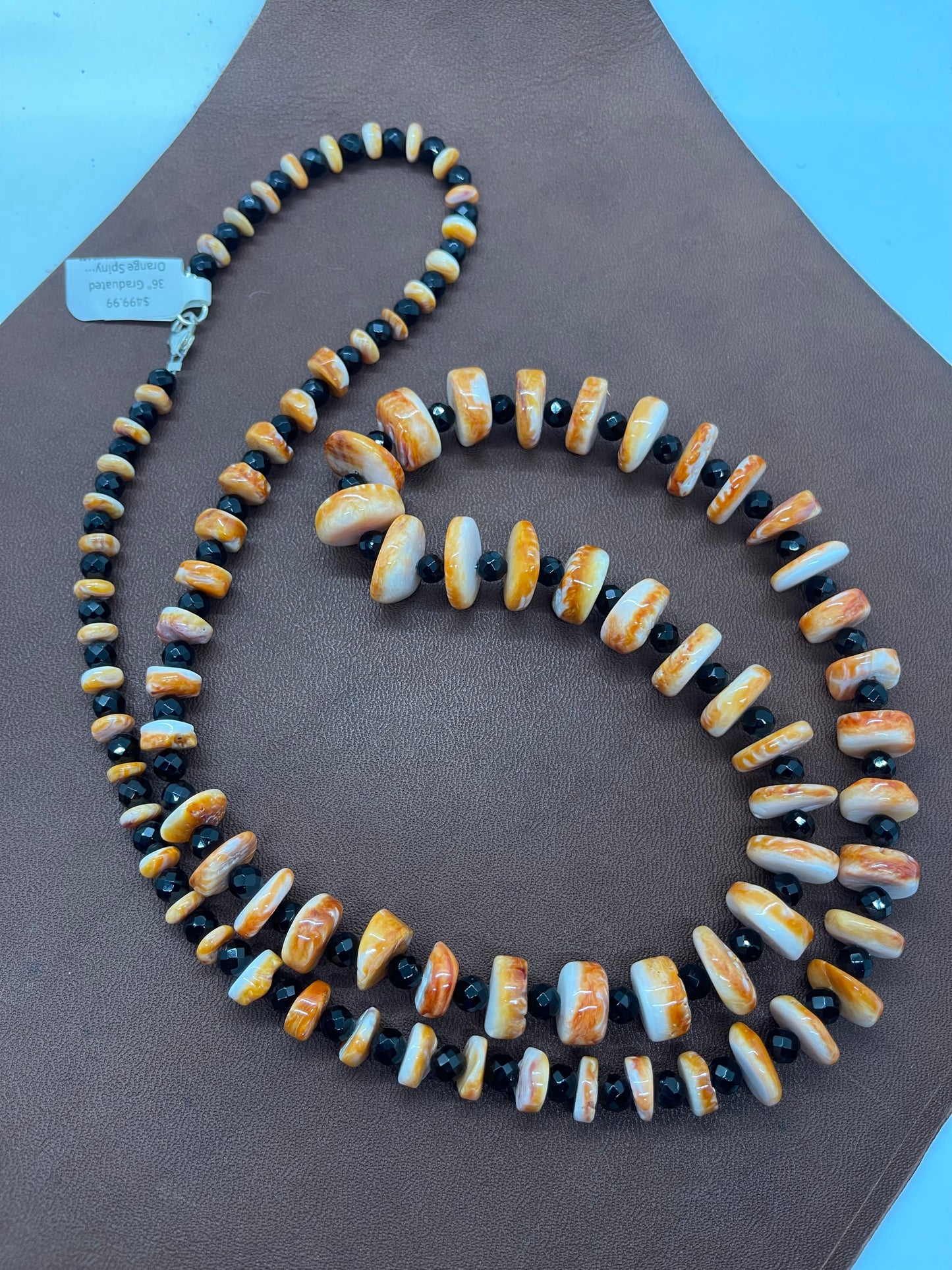36" Graduated Orange Spiny Oyster Shell and Black Onyx Faceted Beaded Necklace