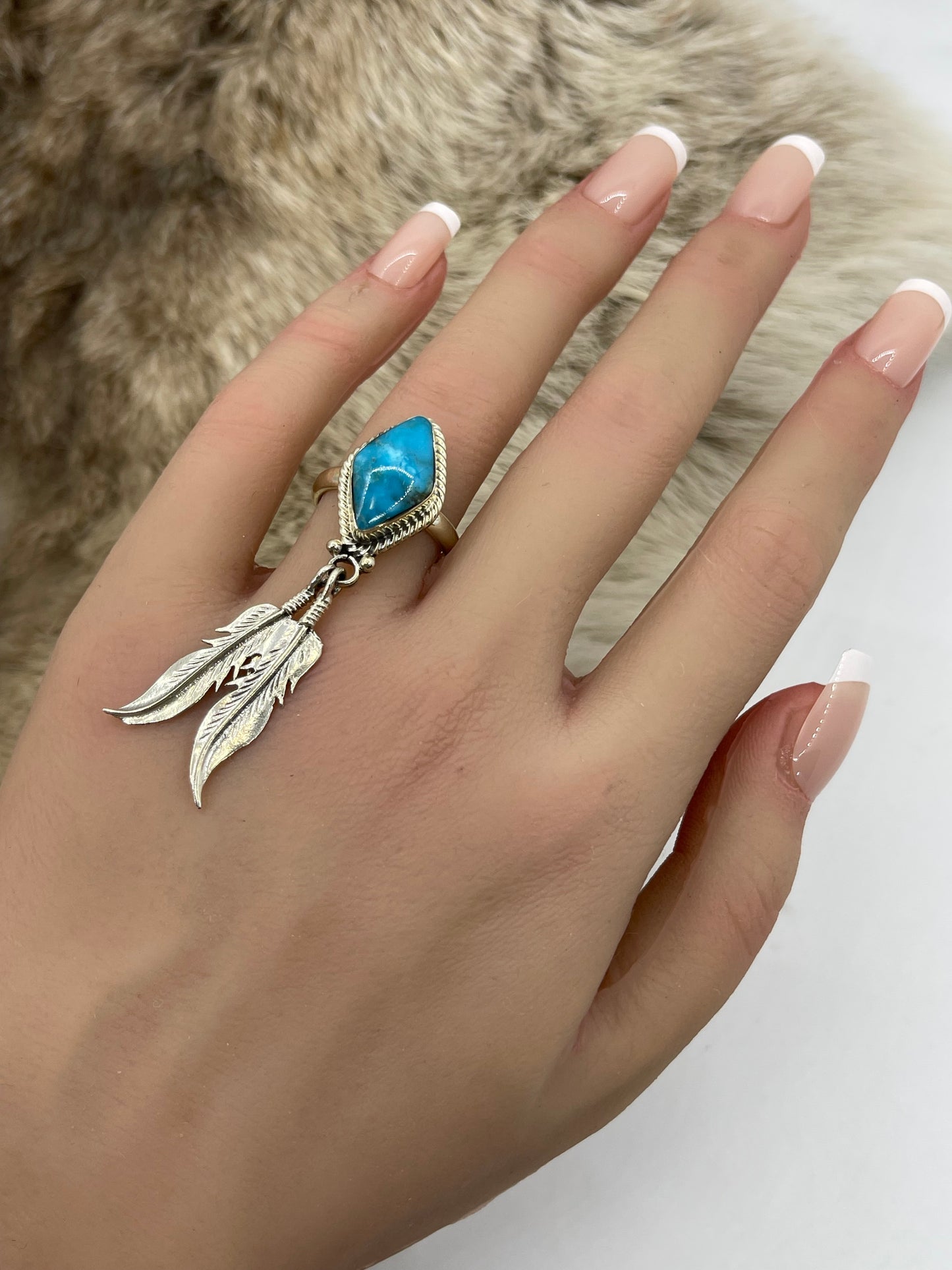 7.0 Turquoise Ring with Feathers by Jerome Lee, Navajo