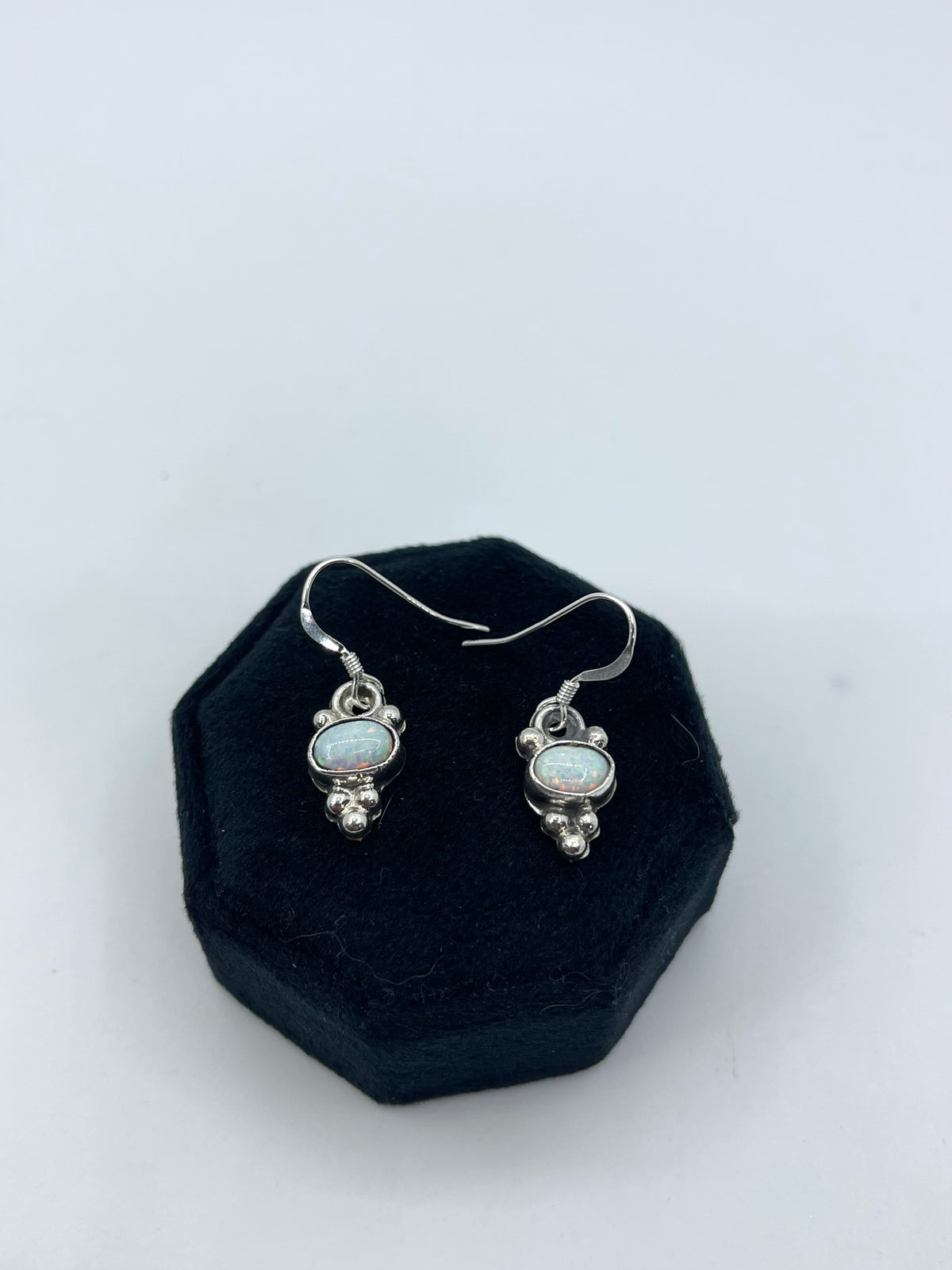 White Opal Hook earrings by Robinson Martinez, Navajo