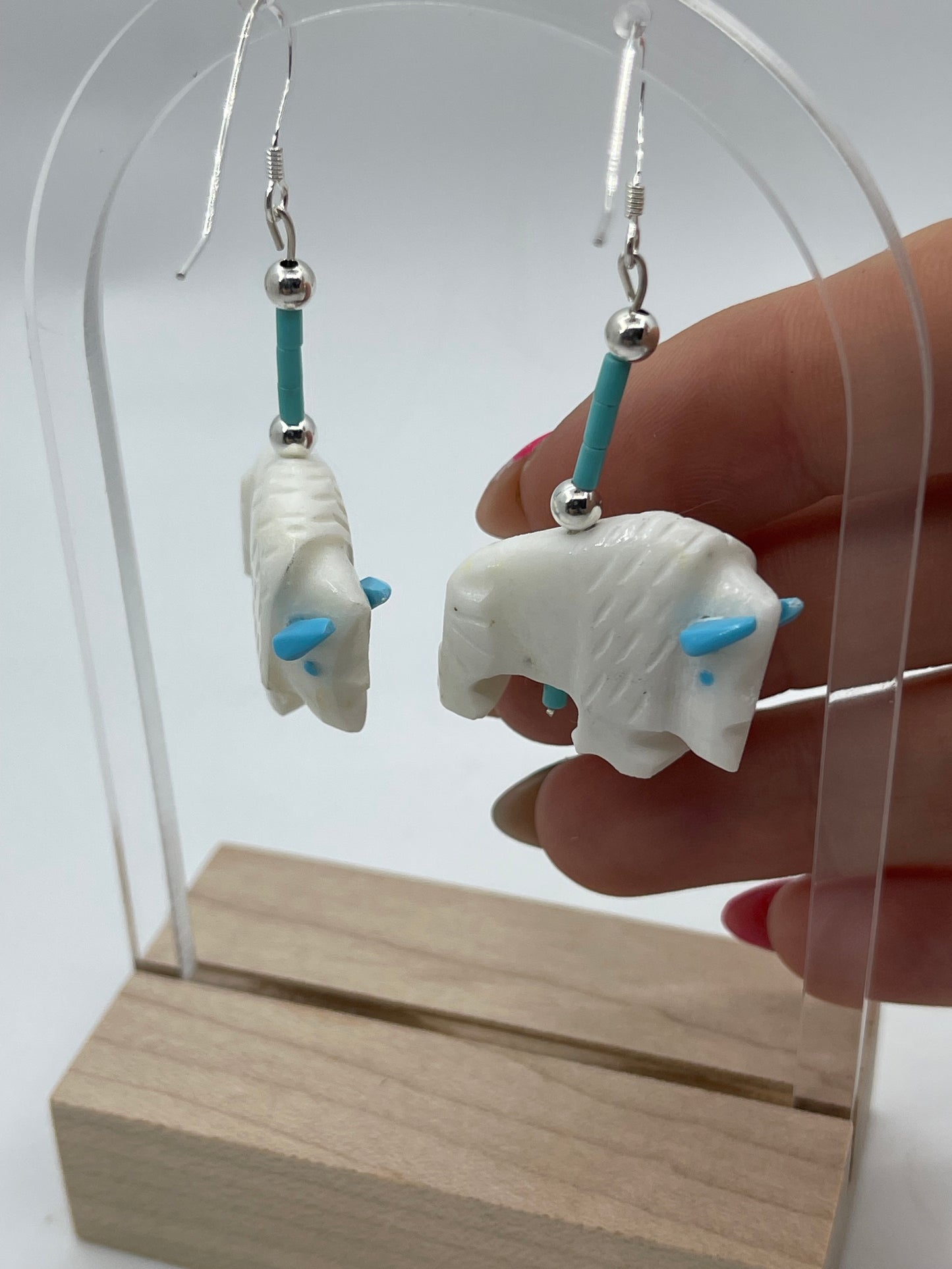 Carved Turquoise Buffalo Dangle Earrings by Todd Etsatie, Zuni