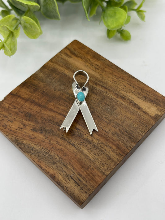 LOT 74 8/30 Sterling Silver Ribbon Pin with Turquoise Stone by Gregg Yazzie, Navajo
