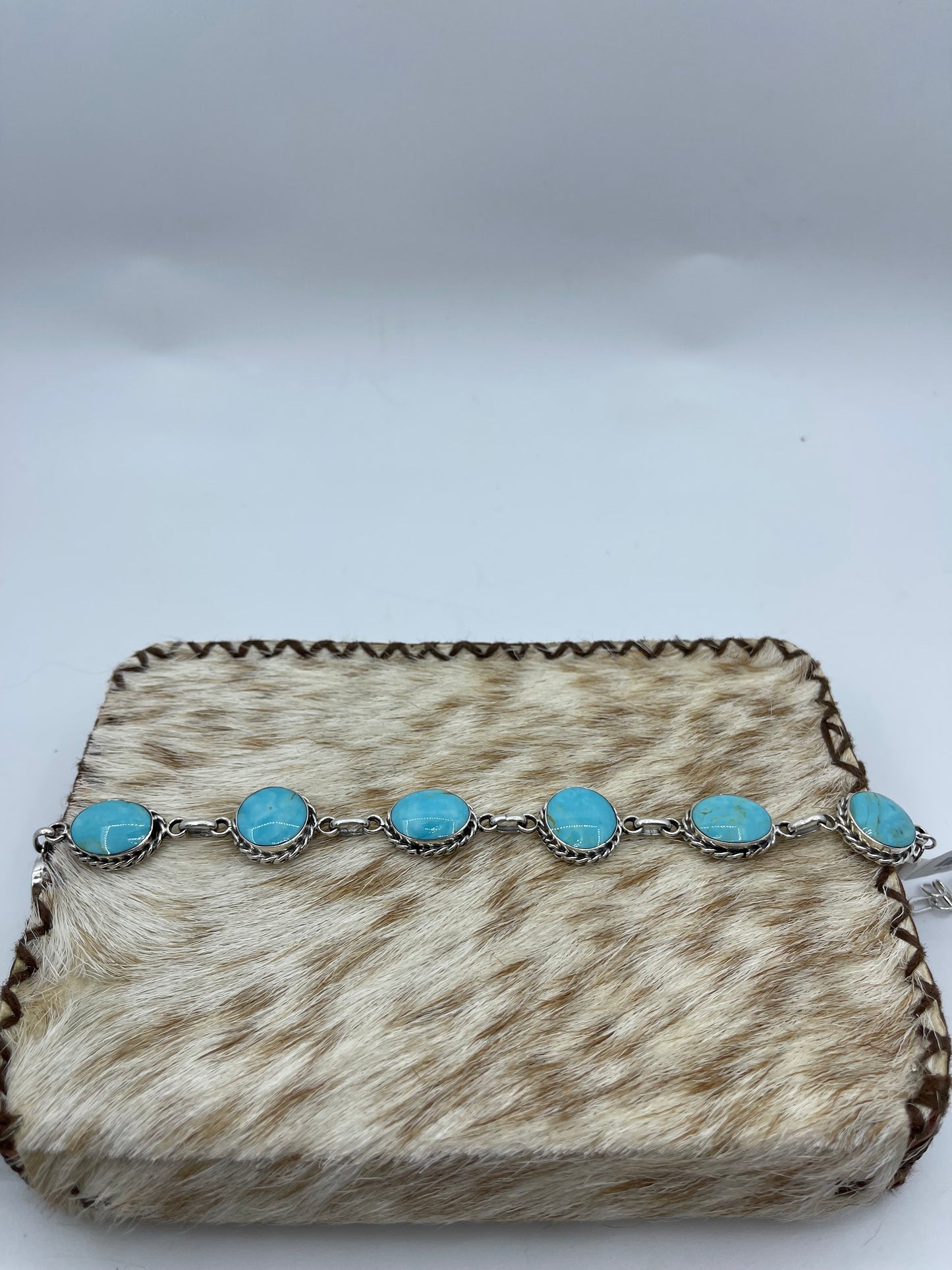 7 1/2"-9 1/2" 7 Stone Turquoise Linked Bracelet by Arlene Lewis, Navajo