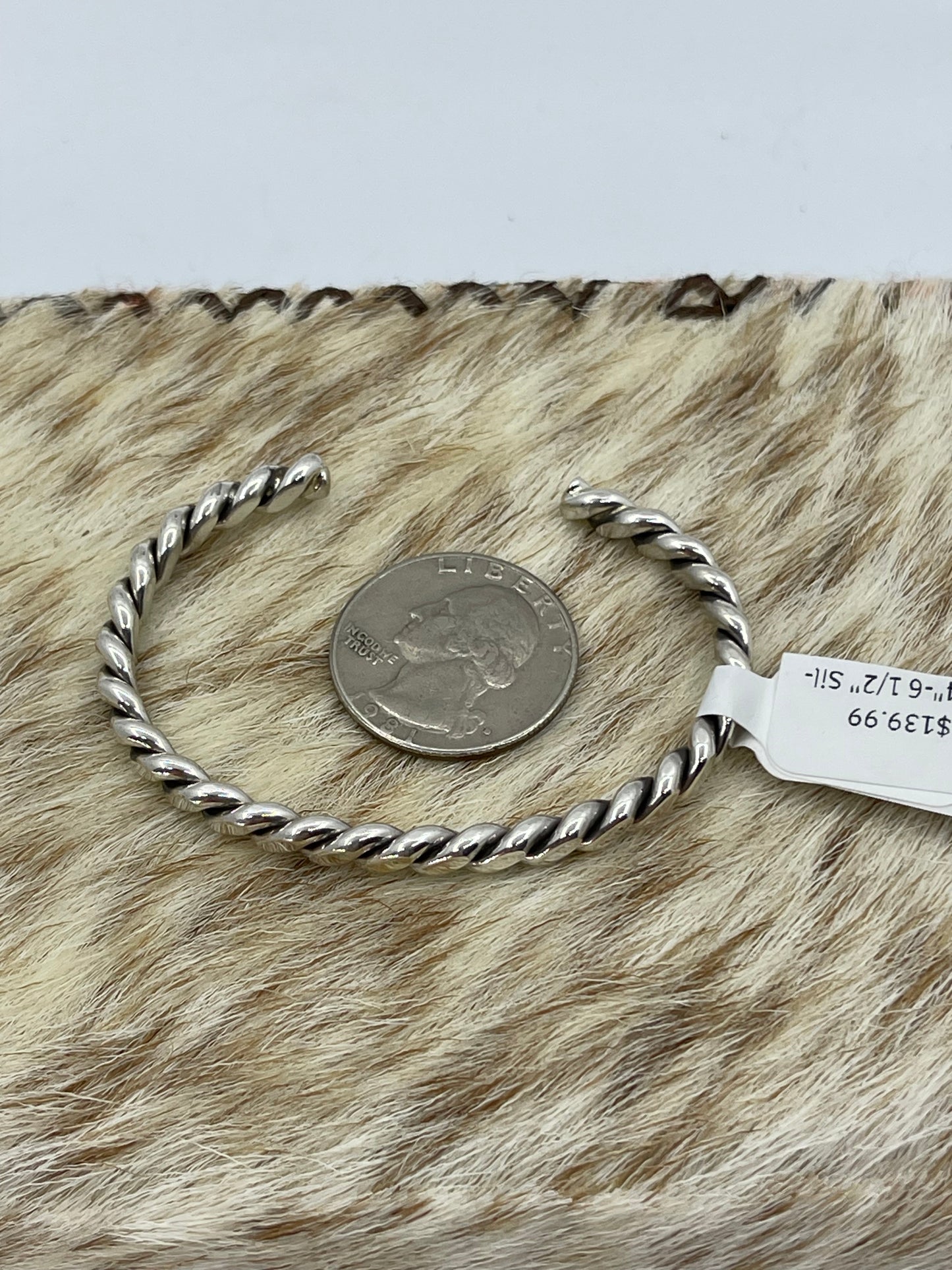 5 1/4"-6 1/2" Silver Twisted Cuff by Elaine Tahe, Navajo